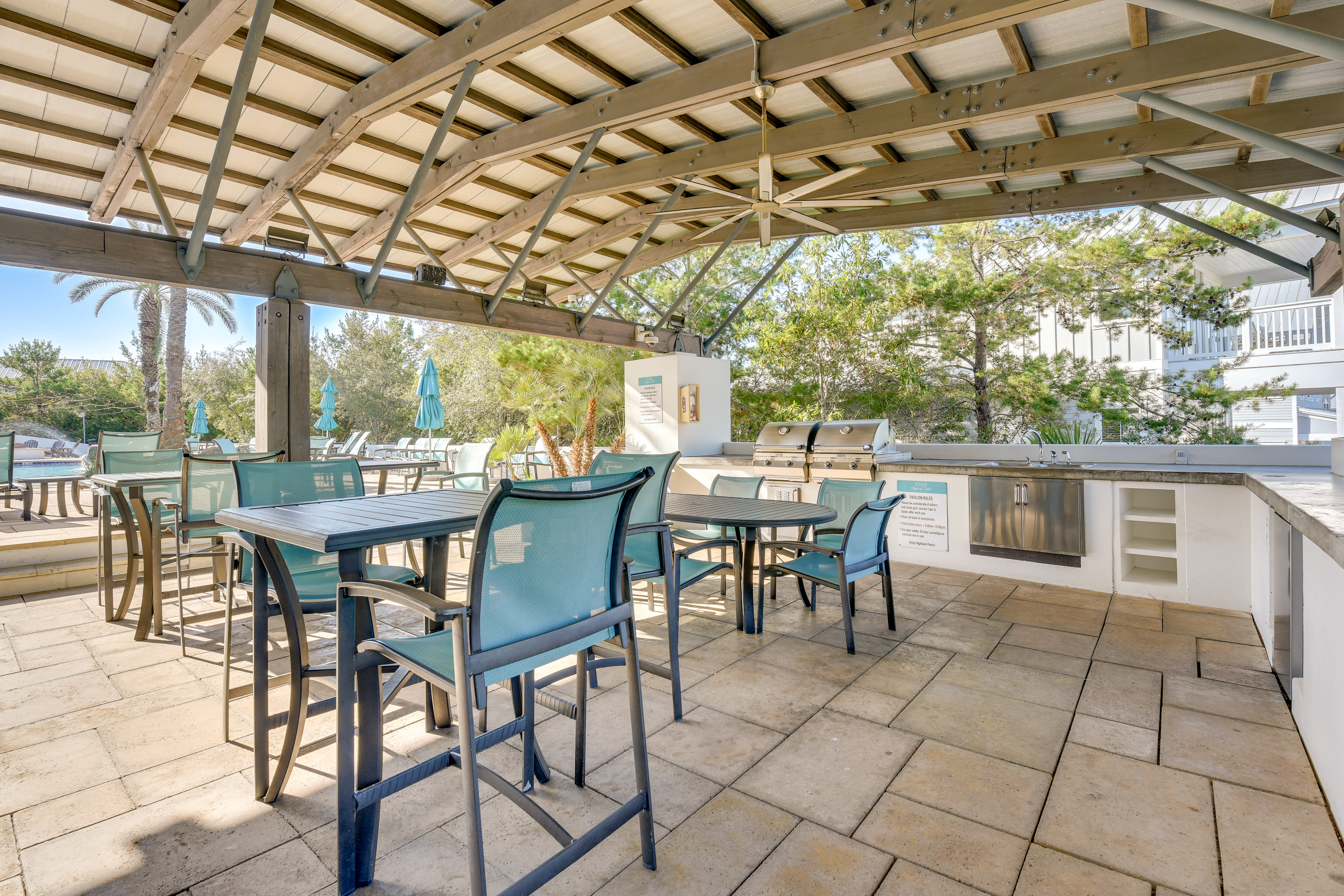 Community Amenities | Outdoor Kitchen + Poolside Lounge