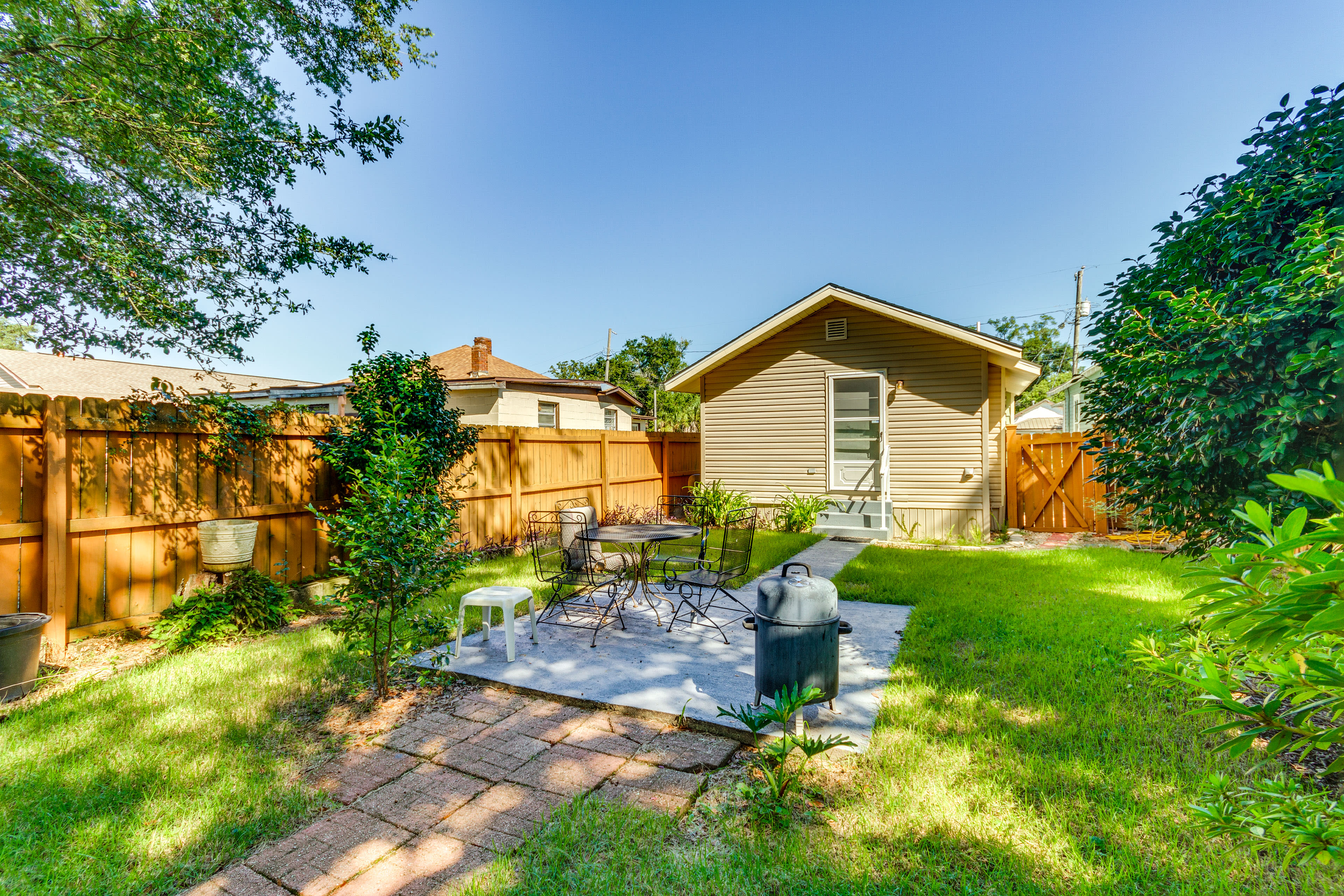 House Exterior | Furnished Patio | Dining Area | Smoker | Private Yard