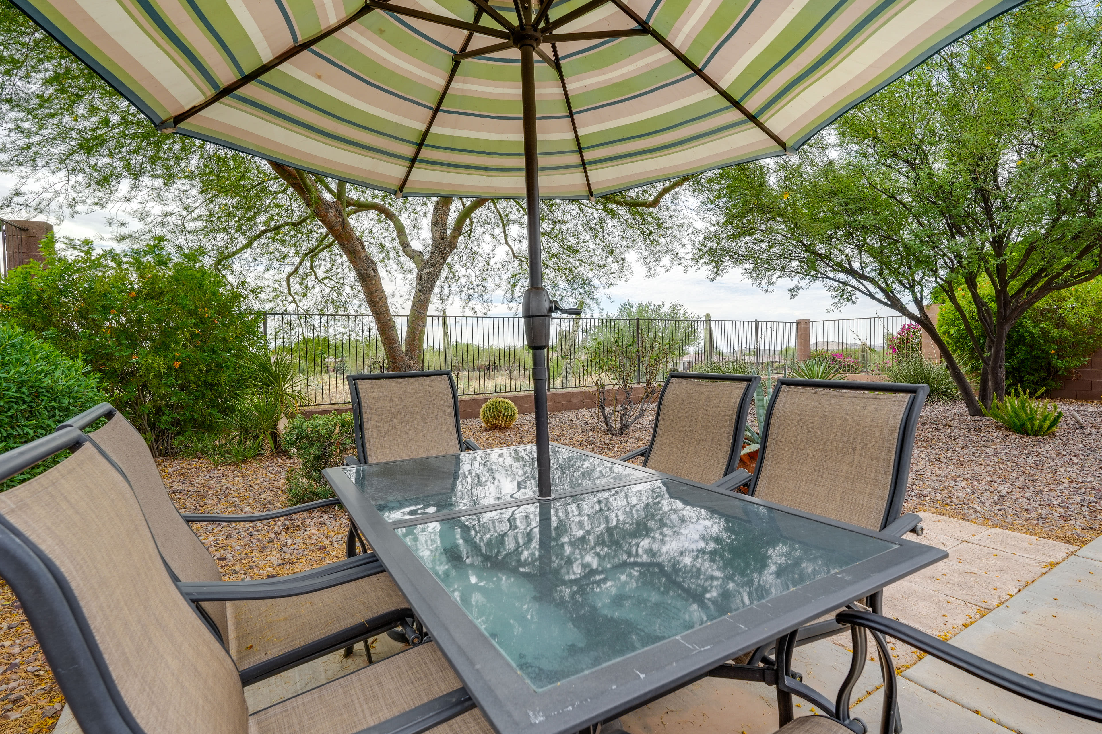 Private Backyard | Patio w/ Dining Area | Golf Course Views