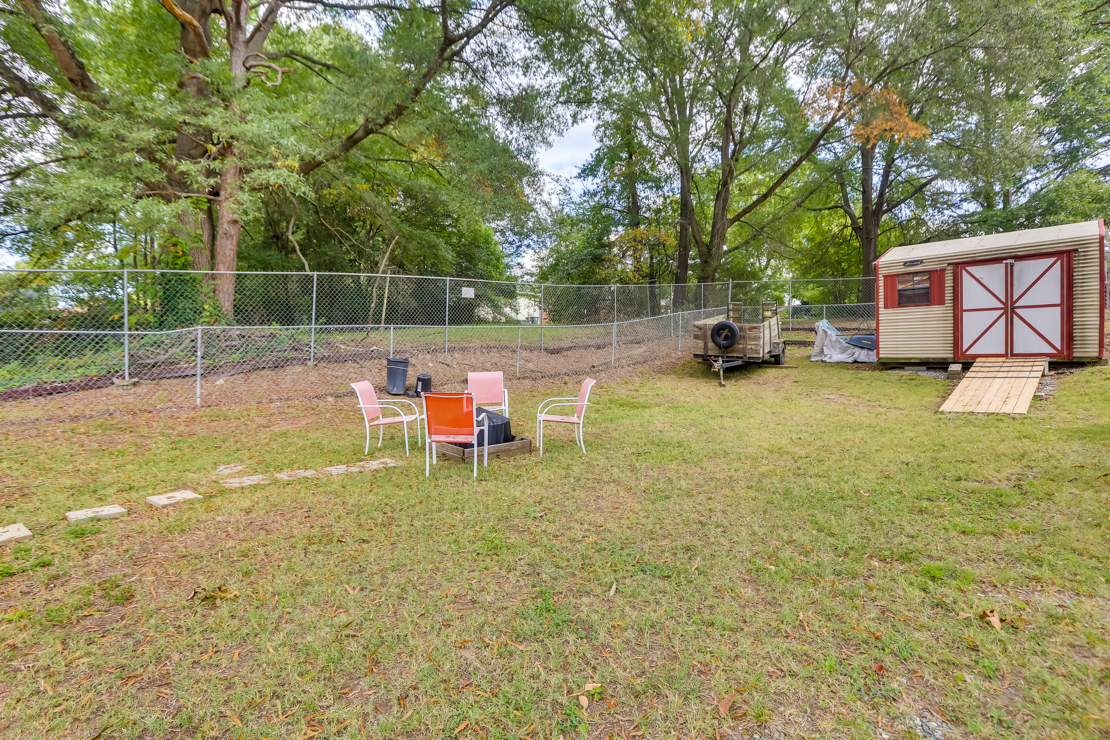 Cottage Exterior | Wood-Burning Fire Pit | Fenced Yard