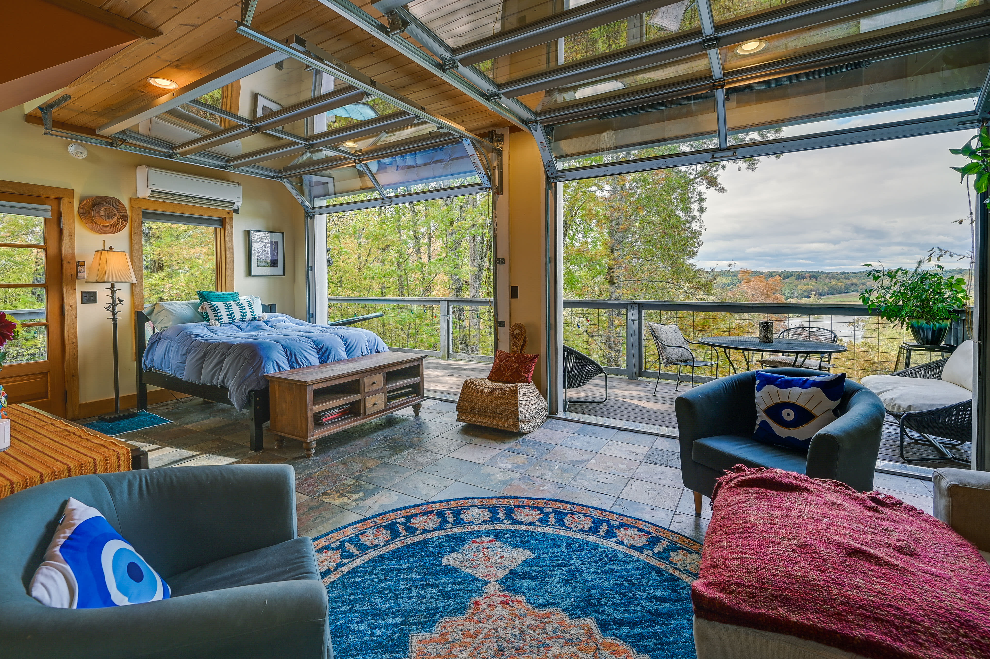 Studio Interior | Full Bed | Glass Garage Doors