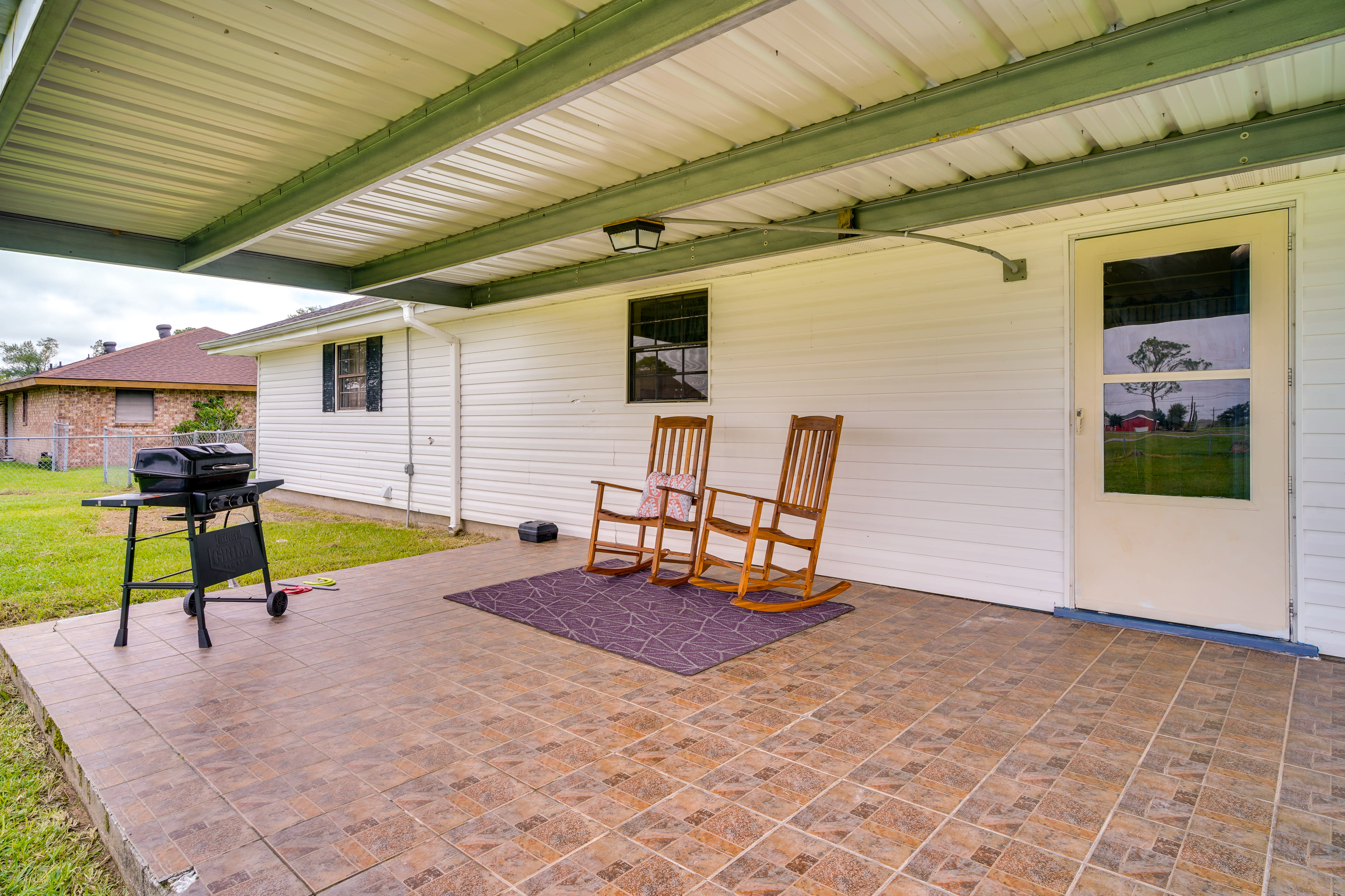 Covered Patio | Grill | Rocking Chairs