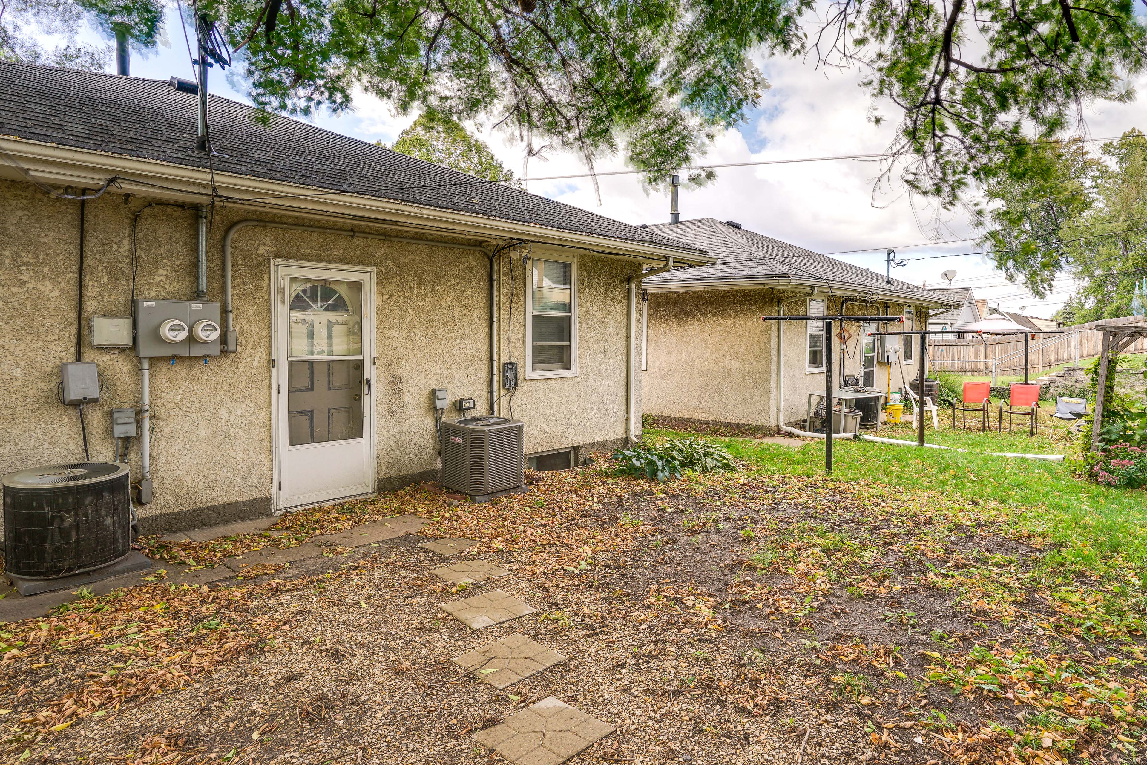 Duplex Exterior | Shared Backyard | Pet Friendly w/ Fee