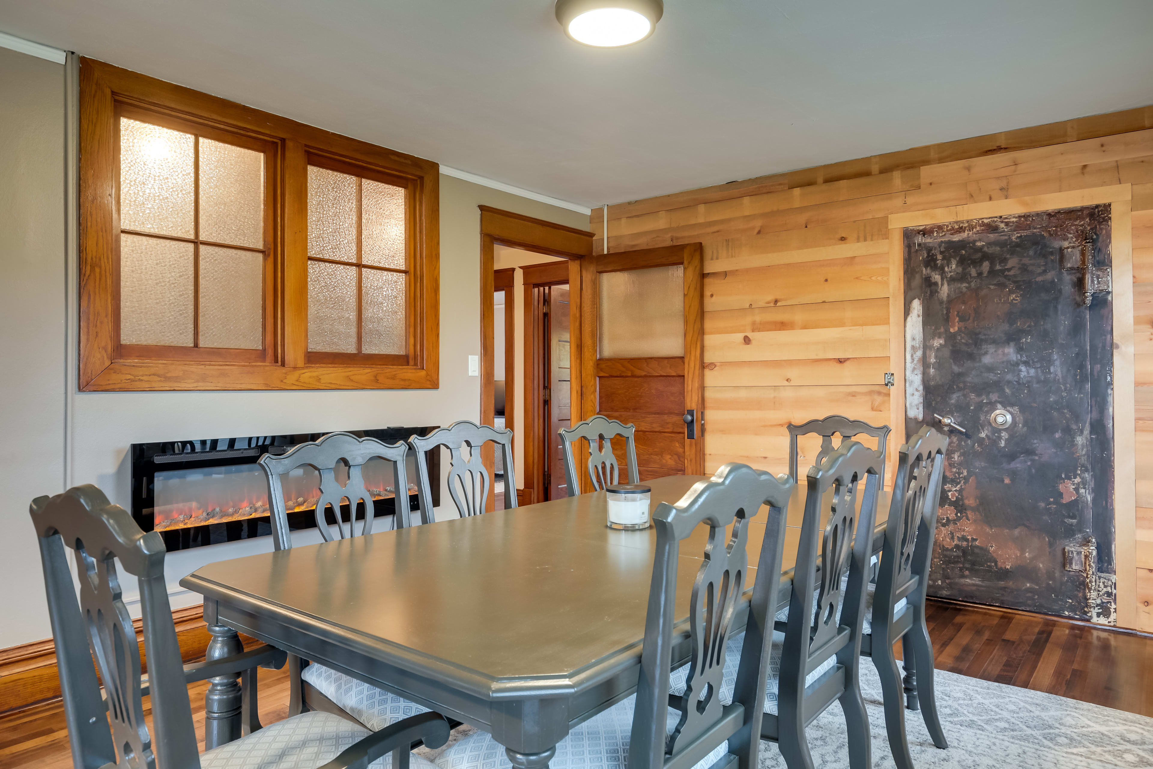 Dining Room | 8-Seat Dining Table | Electric Fireplace | Dishware + Flatware