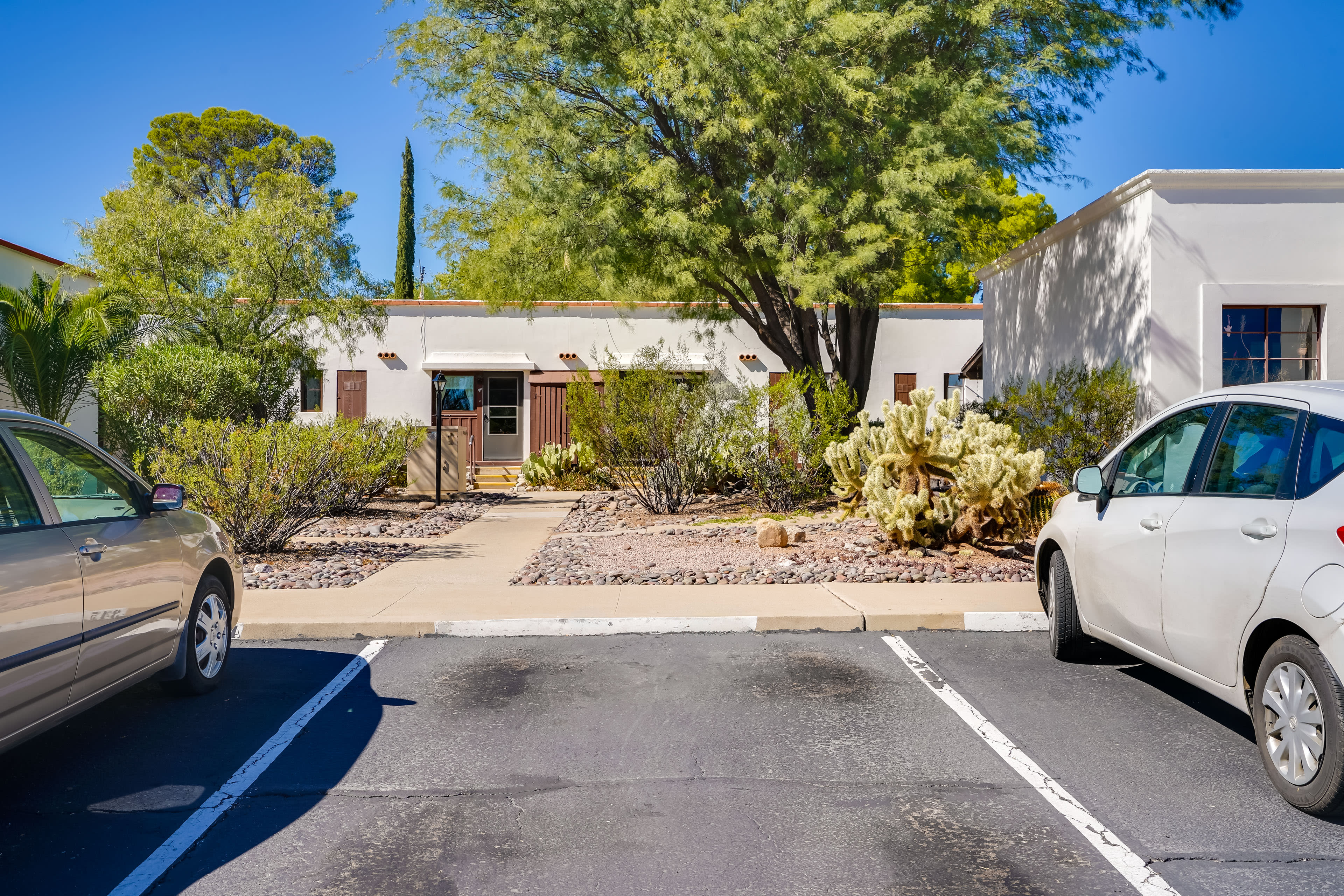 Parking | Designated Parking Space + Community Lot (2 Vehicles w/ Addt'l Fee)