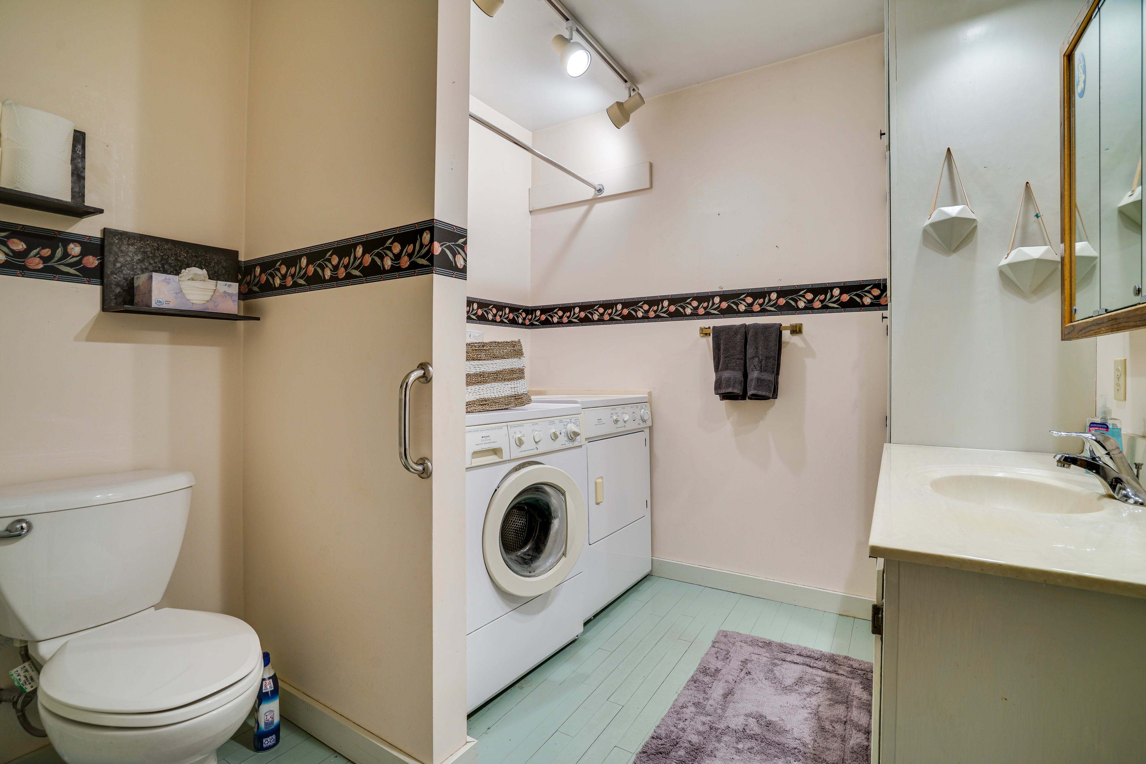 Half Bathroom | Laundry Area | Washer + Dryer