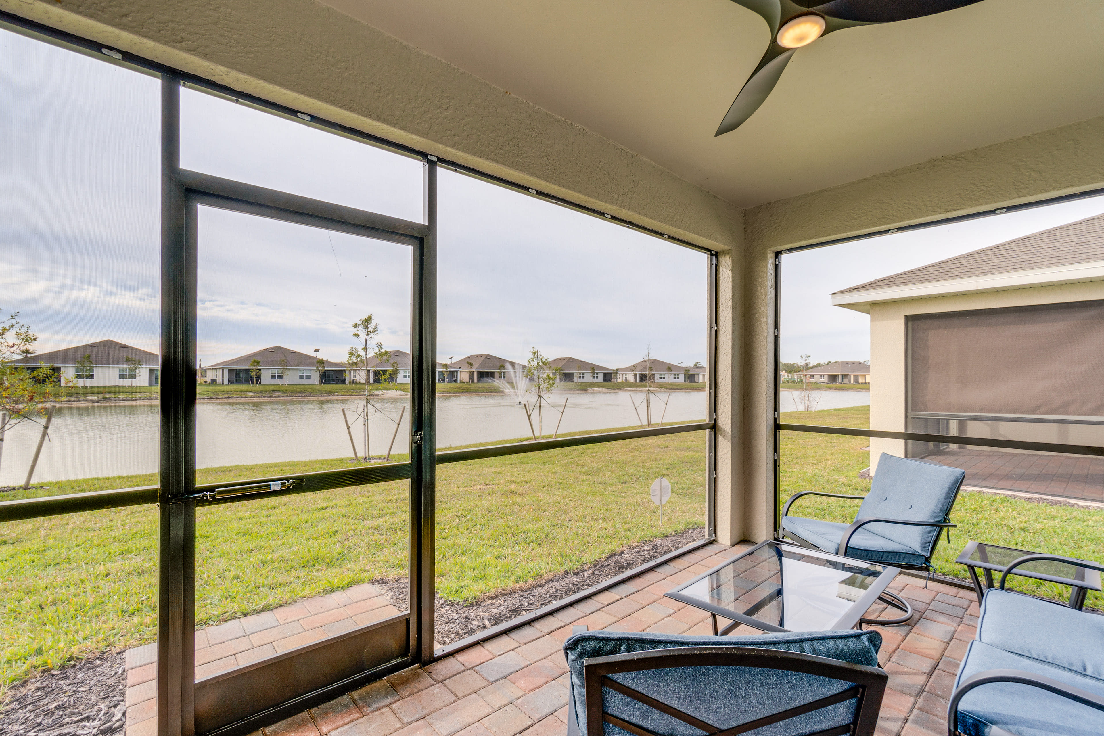 Screened-In Patio | Outdoor Seating | Pond Views