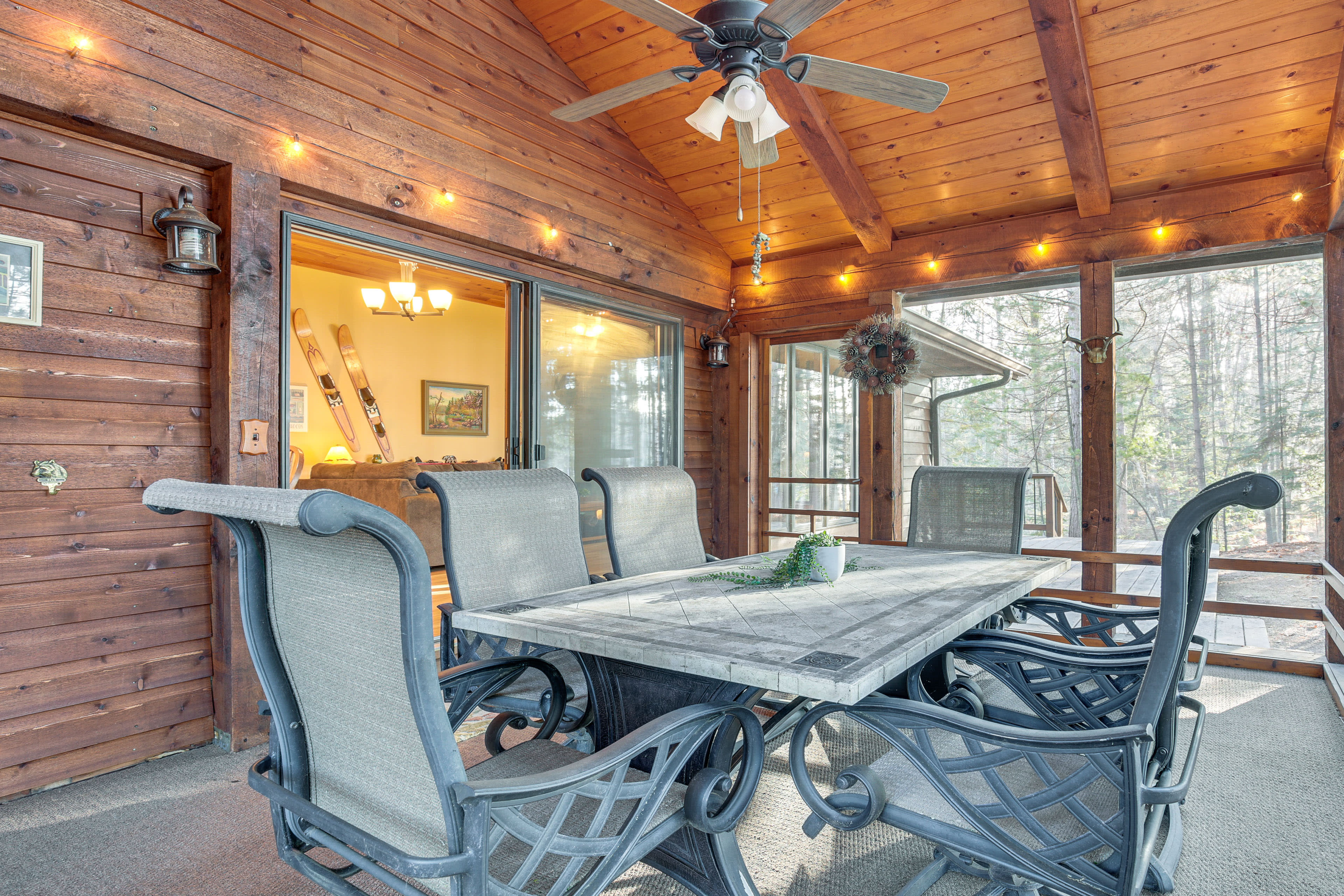 Screened-In Porch | Outdoor Dining Area | String Lights | Lake View