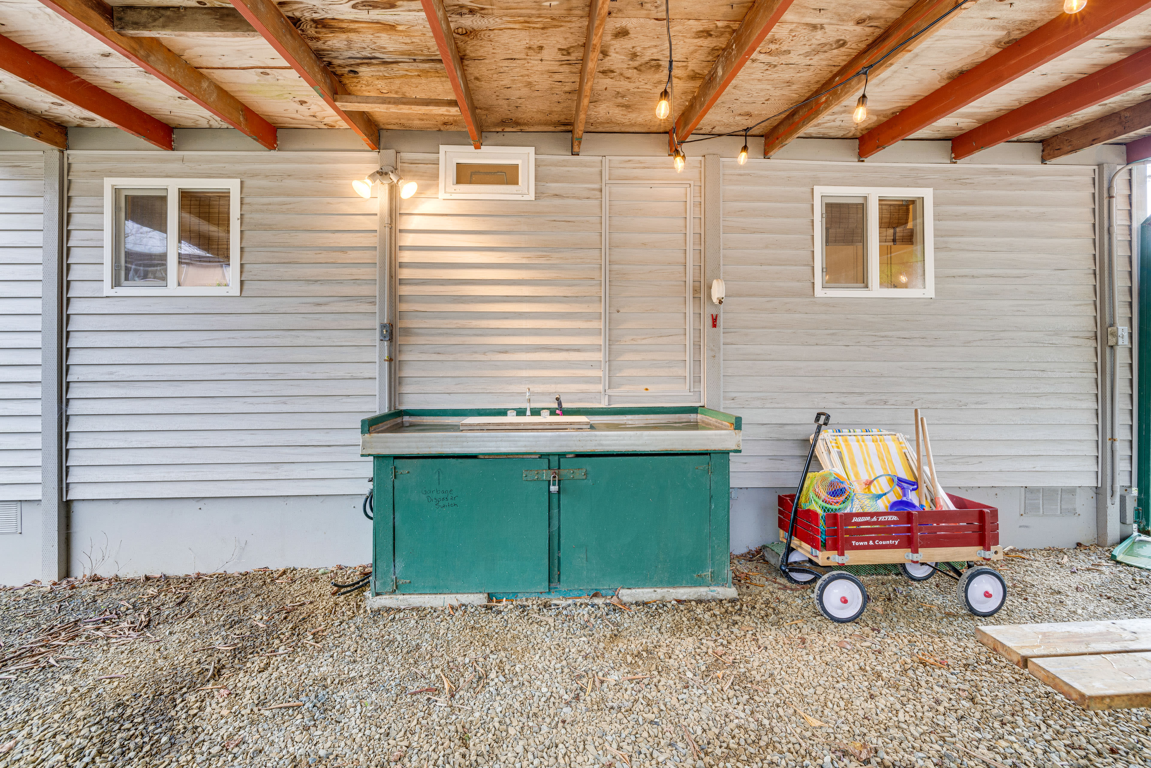 House Exterior | Sink | Beach Wagon w/ Chairs & Toys