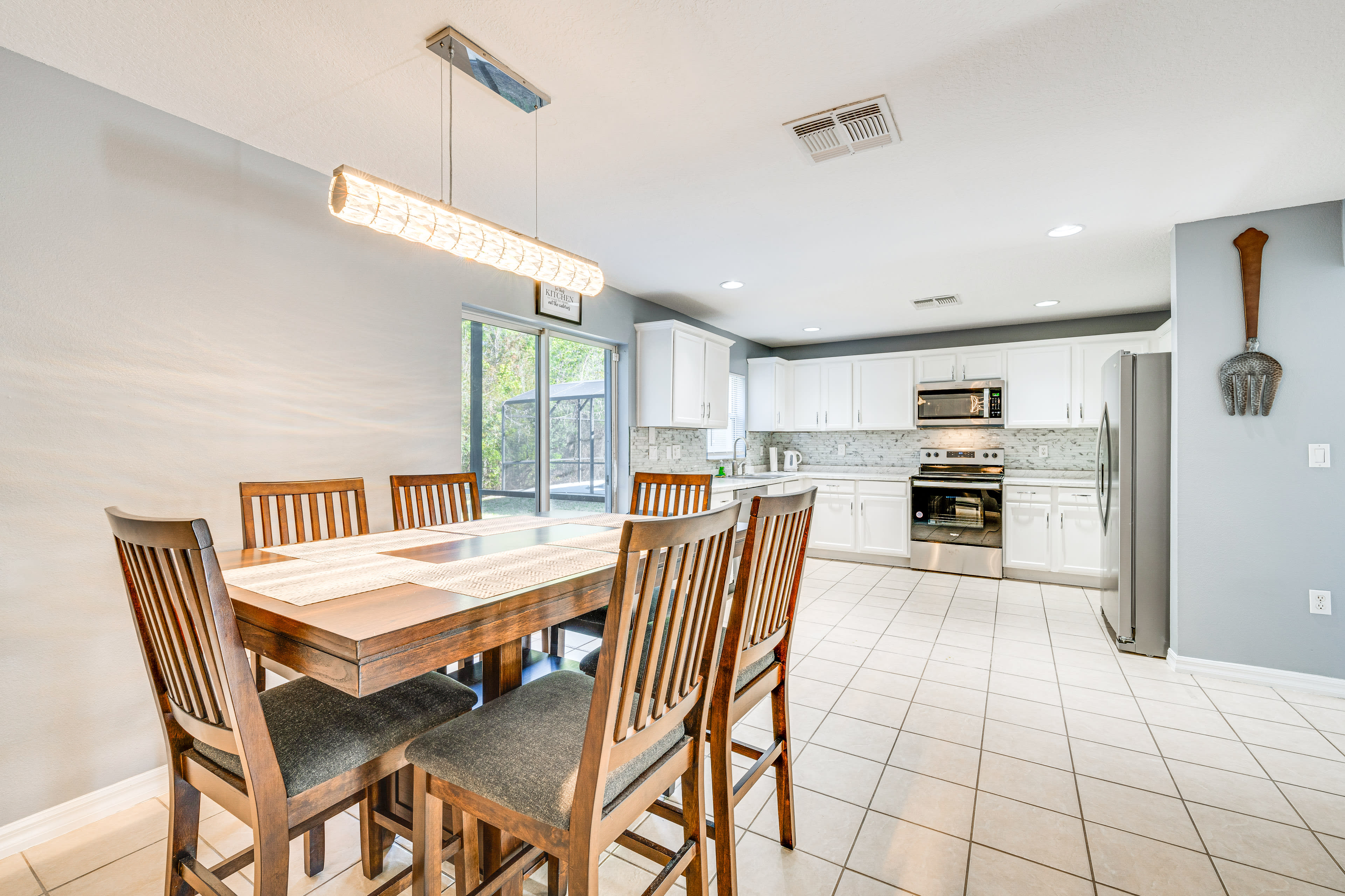 Dining Area | Dishware & Flatware Provided | Central A/C & Heat | 1st Floor