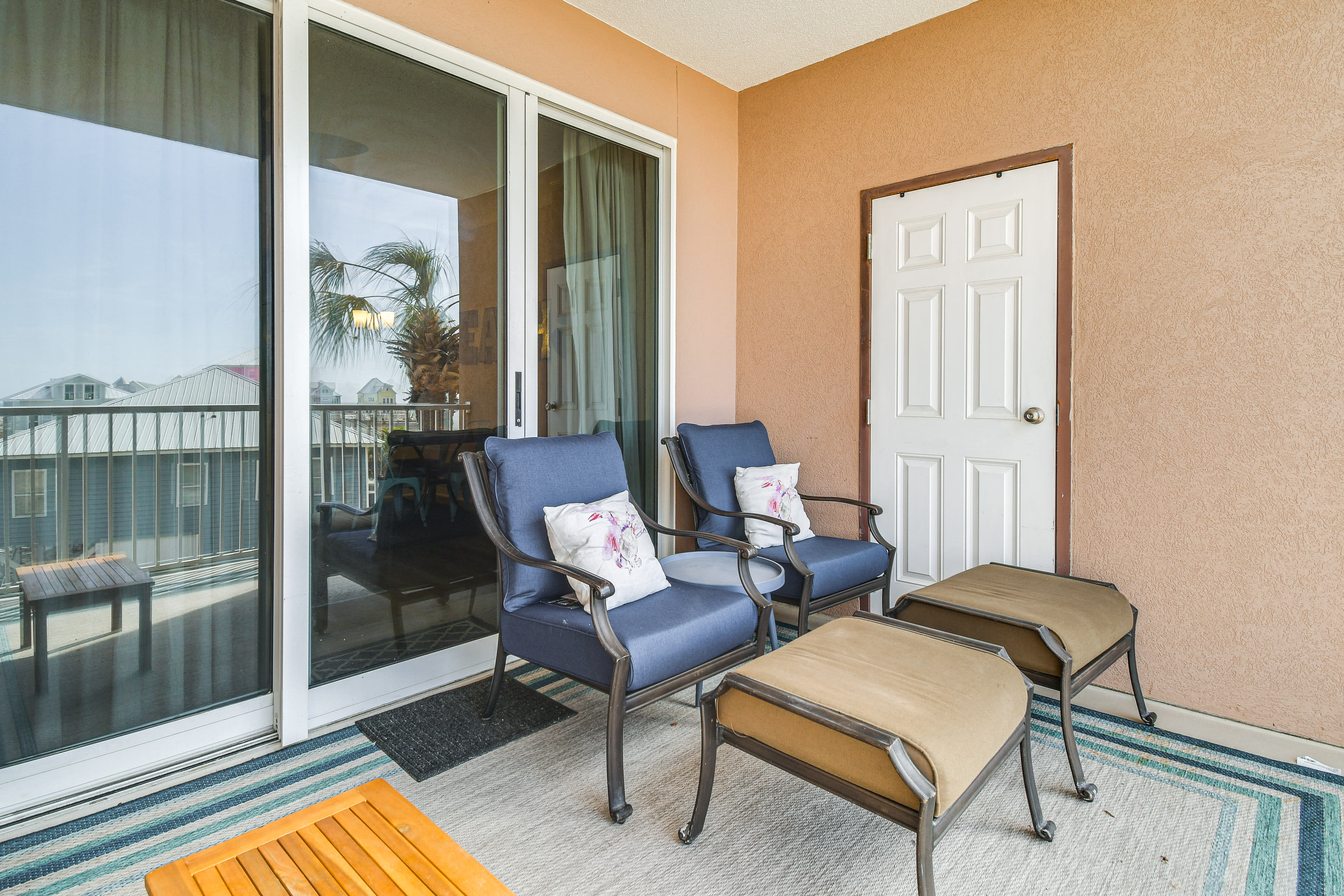 Balcony | Pool View | Beach Toys + Chairs