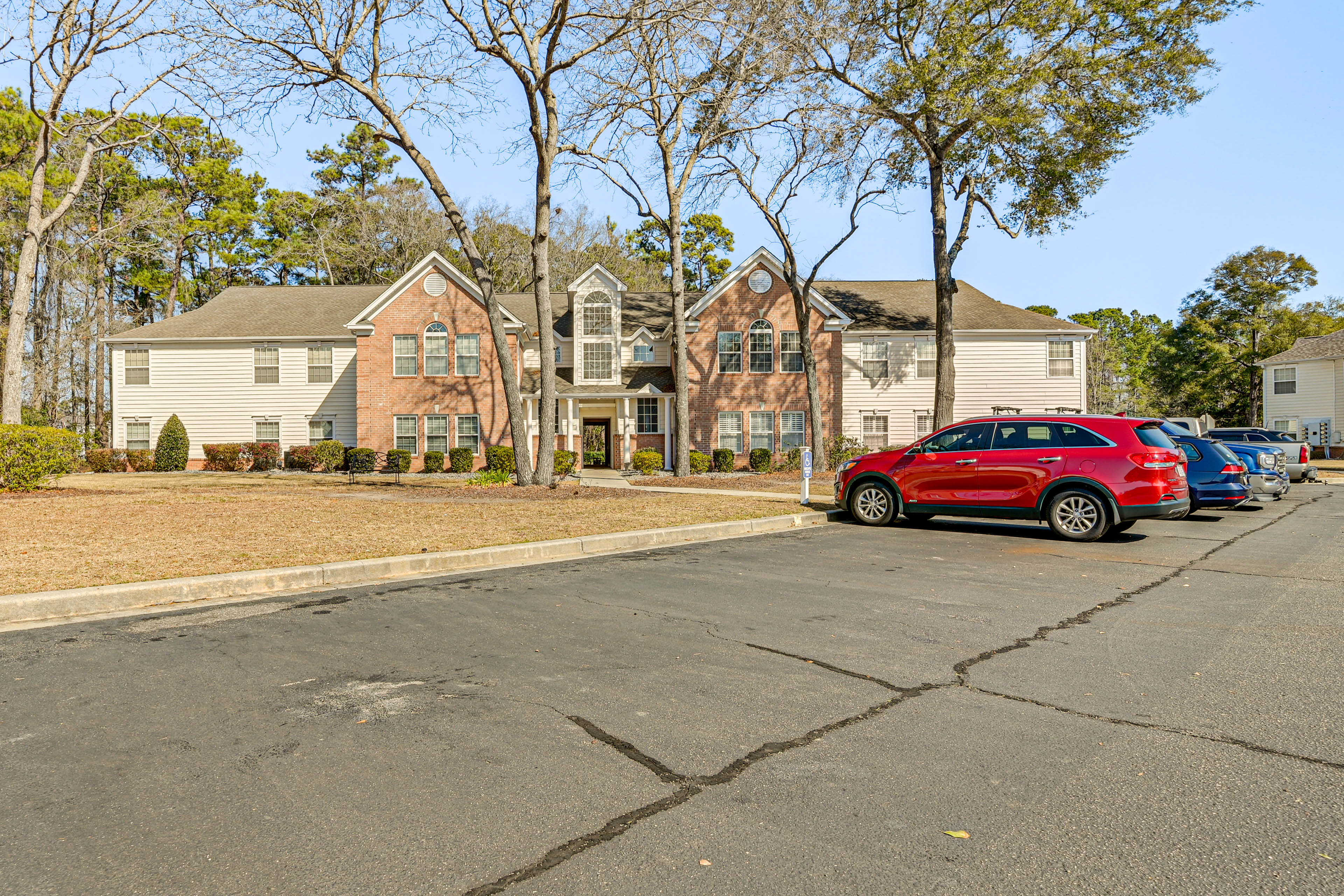 Parking | Community Lot w/ Pass (1 Vehicle) | Free Street Parking