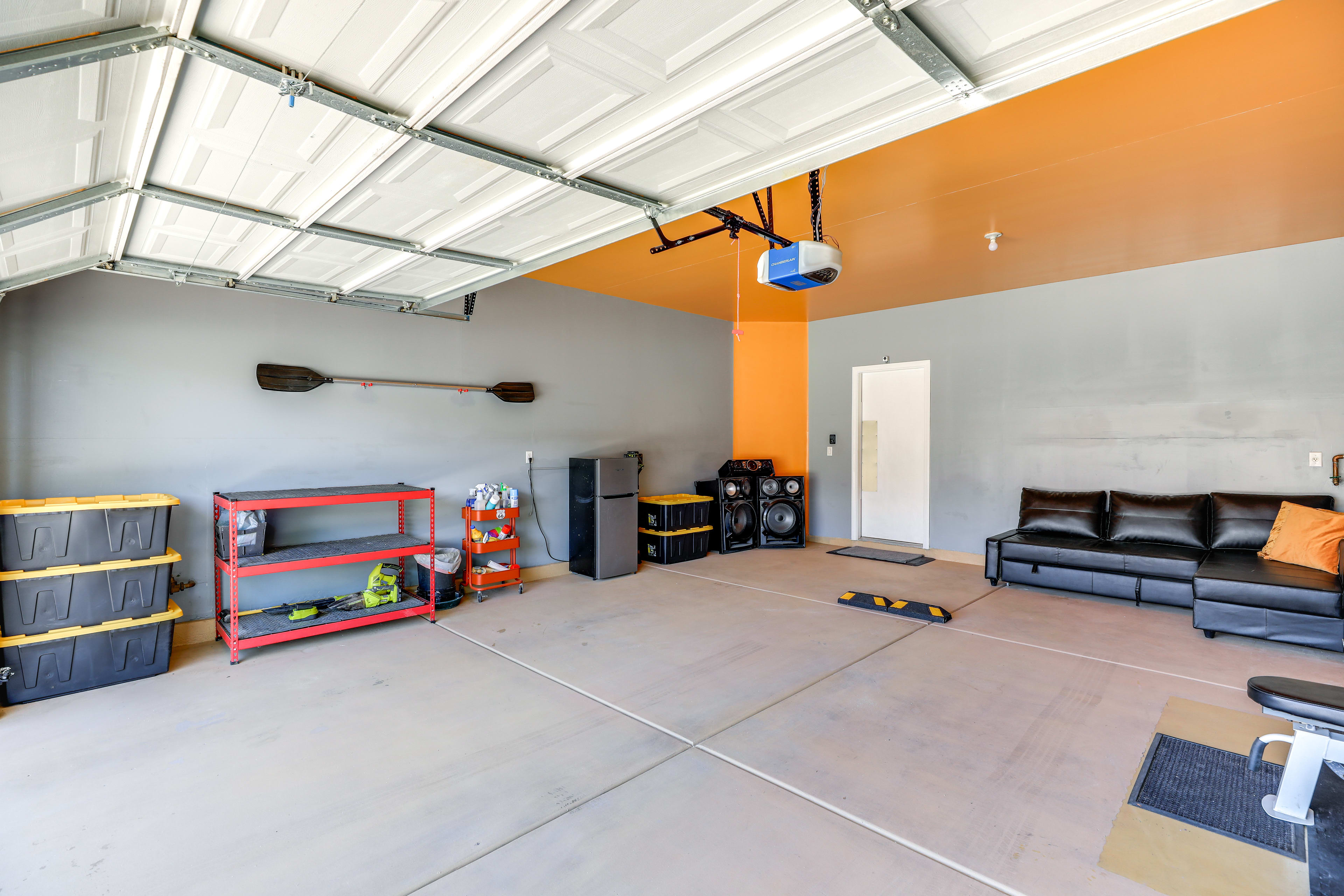 Garage | Full Sleeper Sofa | Bicycles | Weightlifting Area