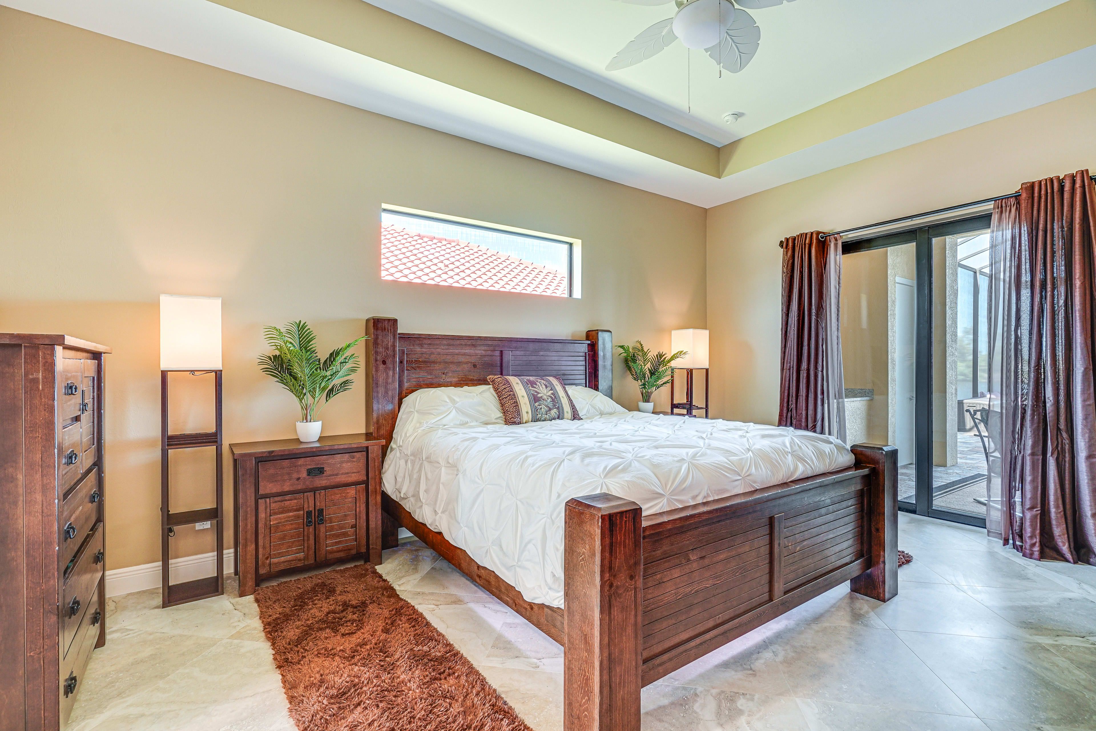 Bedroom 1 | King Bed | Linens Provided | Patio Access | Smart TV
