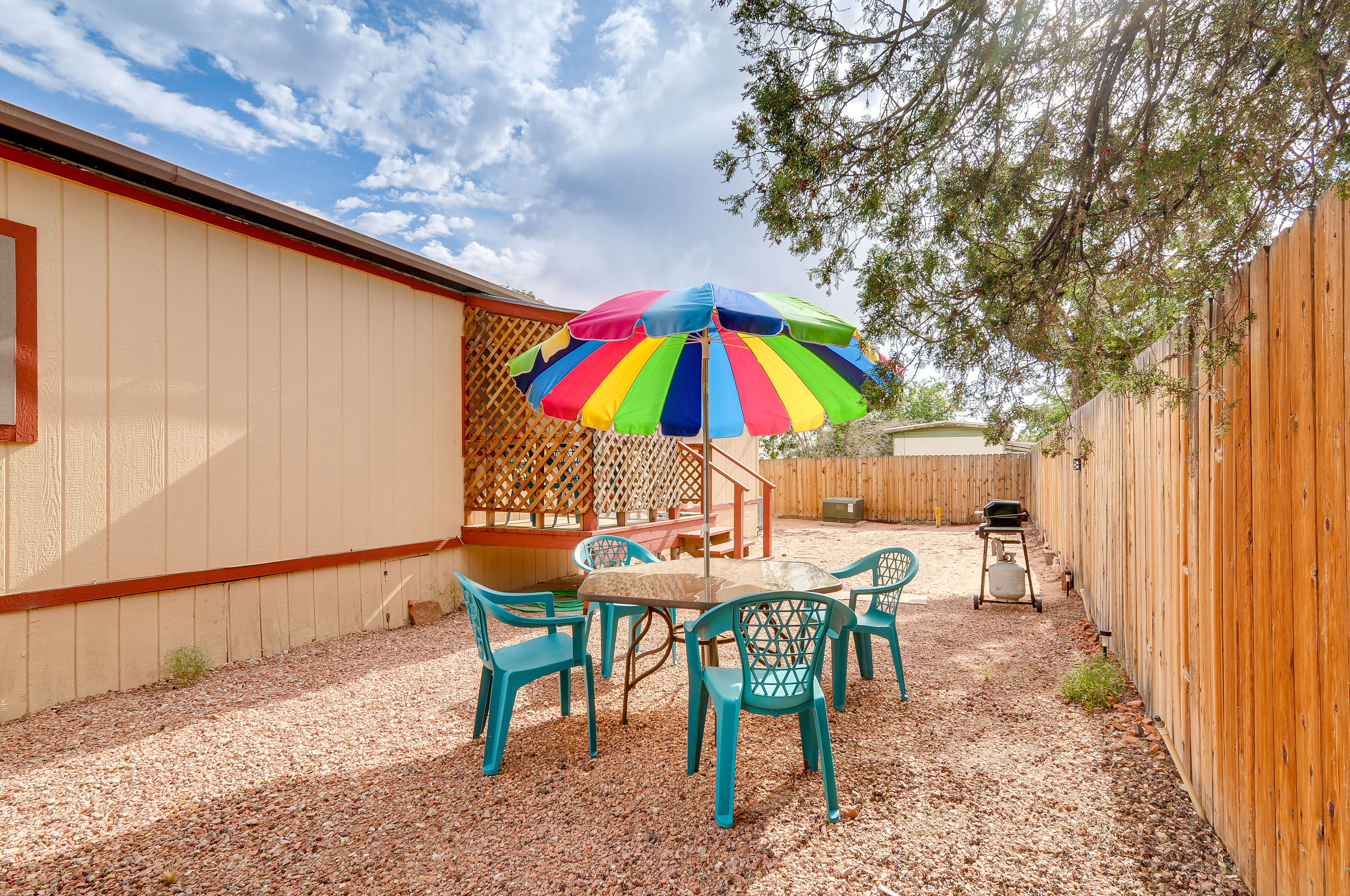 Fenced-In Yard | Outdoor Dining Set | Gas Grill