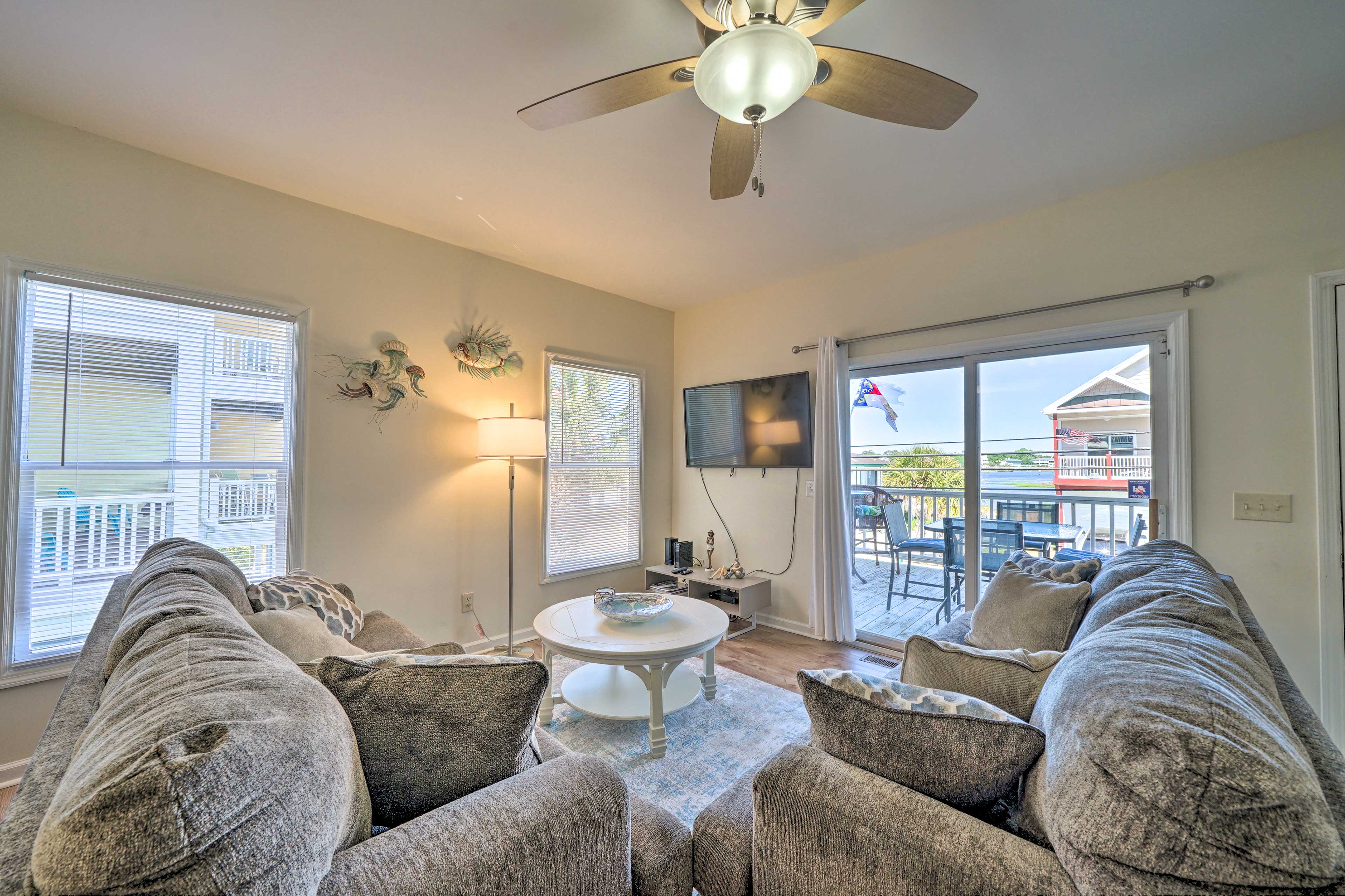 Carolina Beach Condo with Deck Steps to Shore! Evolve