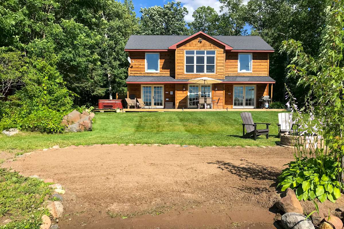 Spacious Hillman Home on Long Lake w/ Dock & Beach Evolve