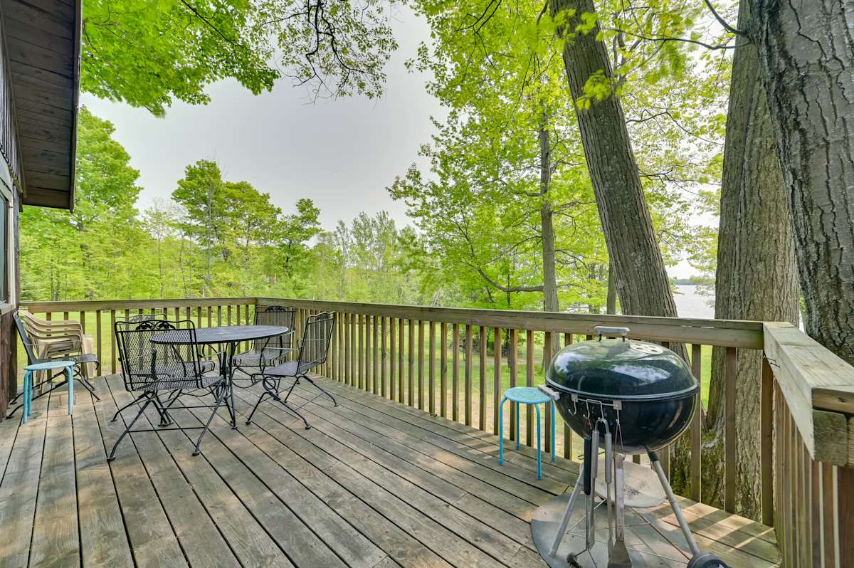 Waterfront Paradise Lake Cottage w/ Pvt Dock! Carp Lake, MI Evolve