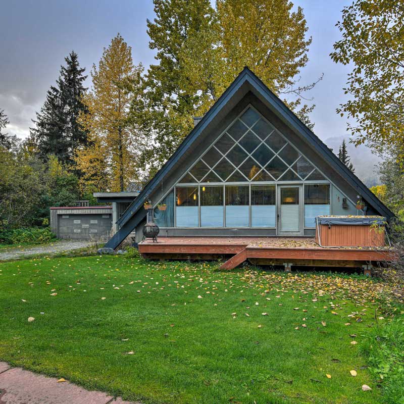 A-frame cabin with a hot tub