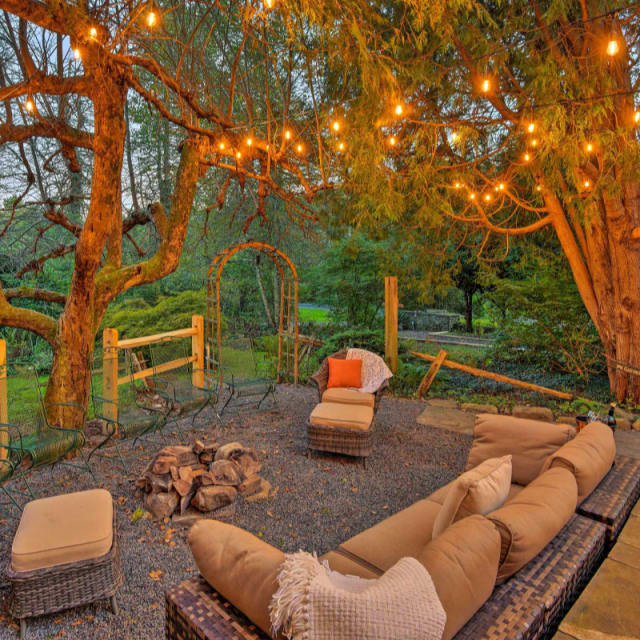 Patio with fire pit and string lights in Tannersville, Pennsylvania