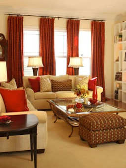 Vacation rental living room with warm lighting and red accent colors