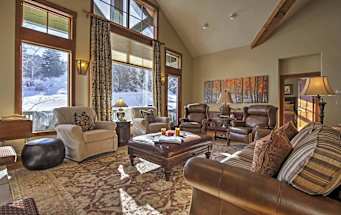 Well-decorated living room with neutral, cozy decor