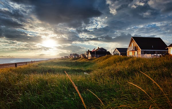 Beachfront homes and marshy grasses in Cape Cod, Massachusetts