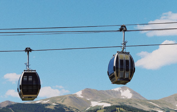 Ski resort gondola with mountain backdrop in Summit County, Colorado