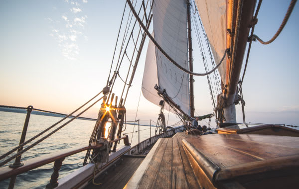 Sailboat at sea during a sunset in Traverse City, Michigan