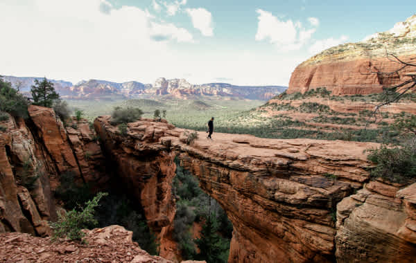 Desert hike across majestic red rocks in Sedona, Arizona