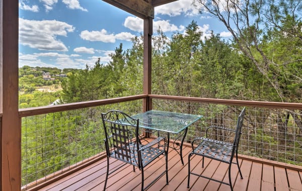 Rental home with balcony overlooking lush forest near Austin, TX