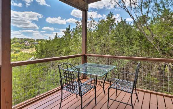 Rental home with balcony overlooking lush forest near Austin, TX