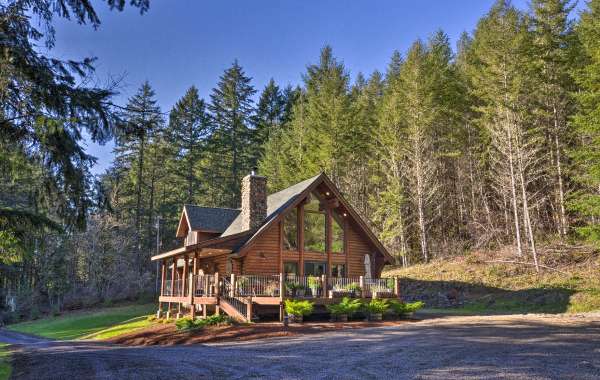 Photo of a log cabin vacation rental in the woods