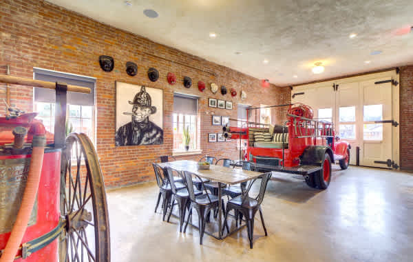 Image of the dining room of a renovated fire station in Tulsa Oklahoma, vacation rental home