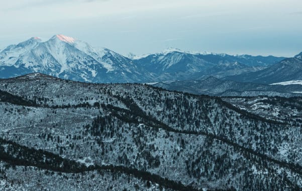 The mountains of Glenwood Springs, Colorado covered in a light dusting of snow