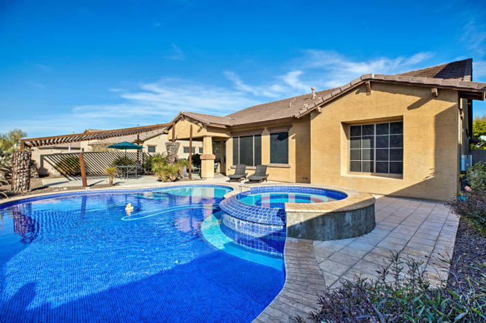 Resort-style pool and hot tub at Goodyear, Arizona vacation rental