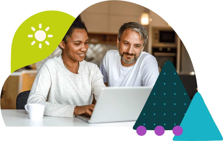 Graphic with a photo of a couple looking at a laptop together, representing their Evolve vacation rental pricing research