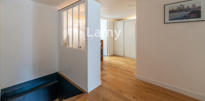 Image 12 sur 18 - Appartement  ·  Vente · Paris (75018) · 4 pièces · 130m²