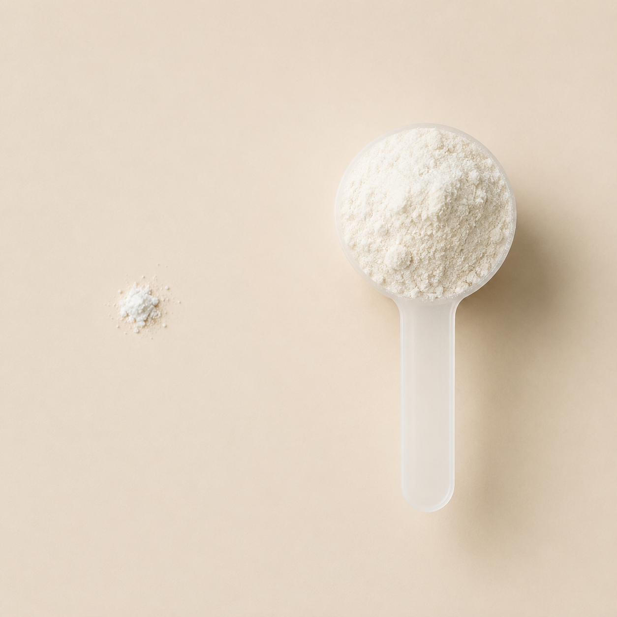 A small pinch of powder beside a full scoop of powder