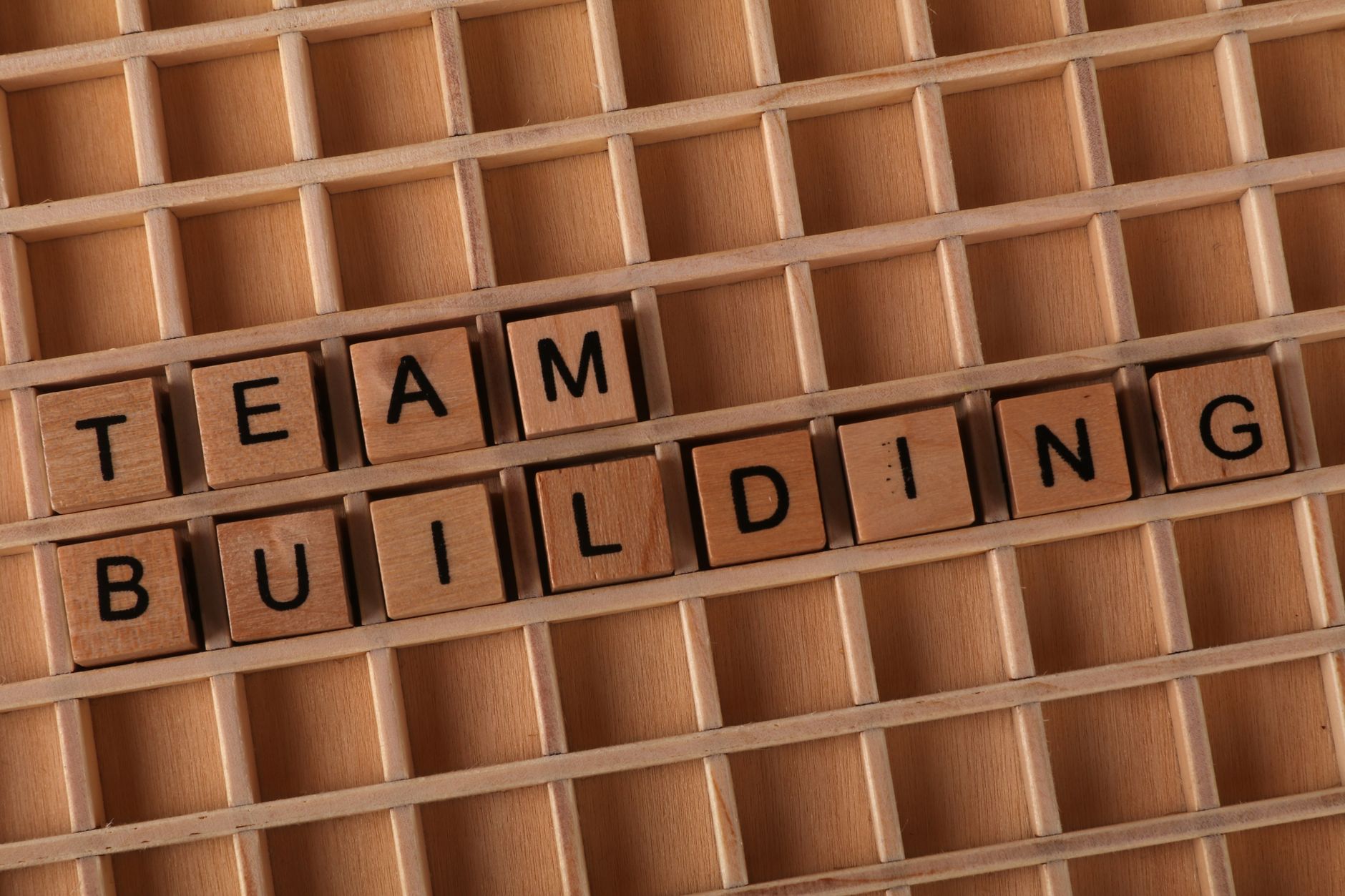Team Building Scrabble Letters on Wooden Box