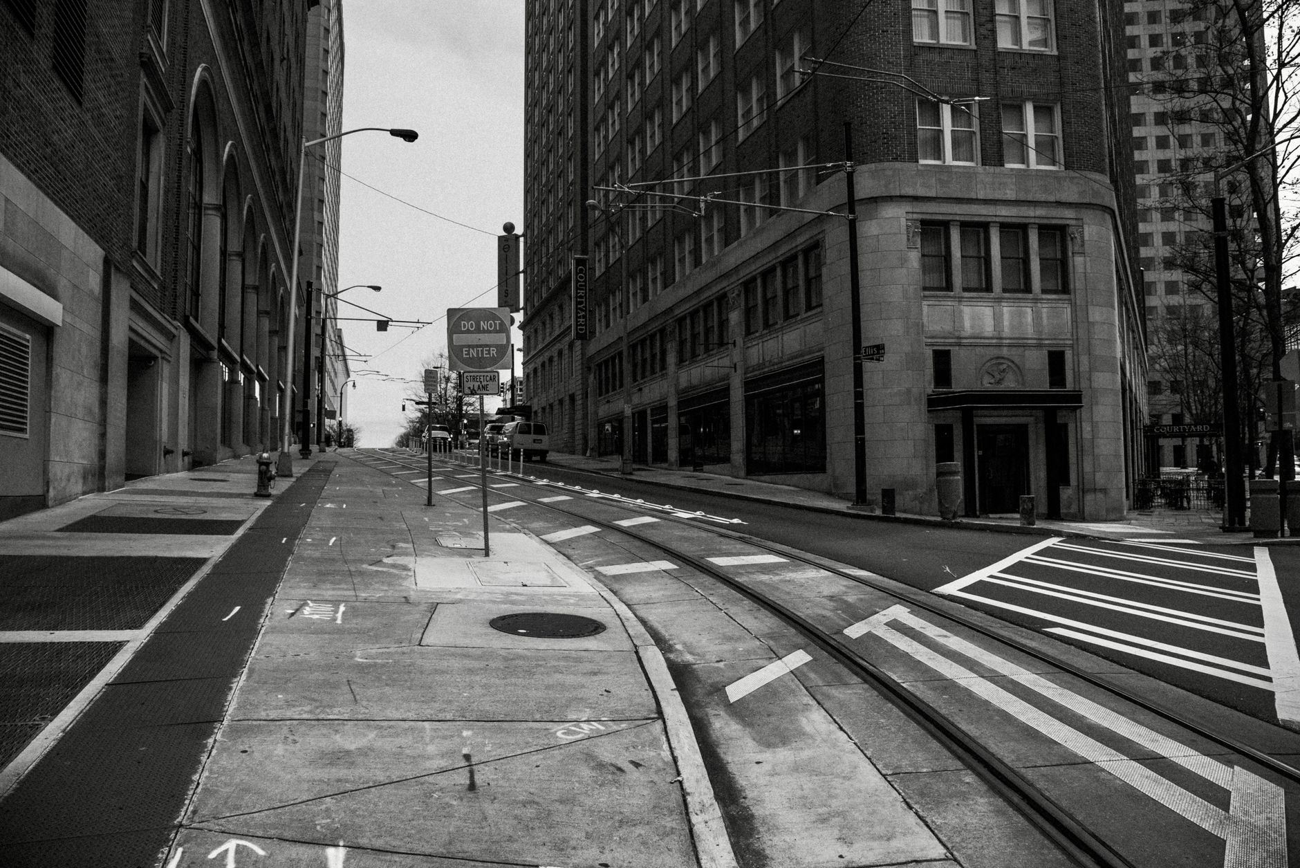 A Grayscale of a Street in a City