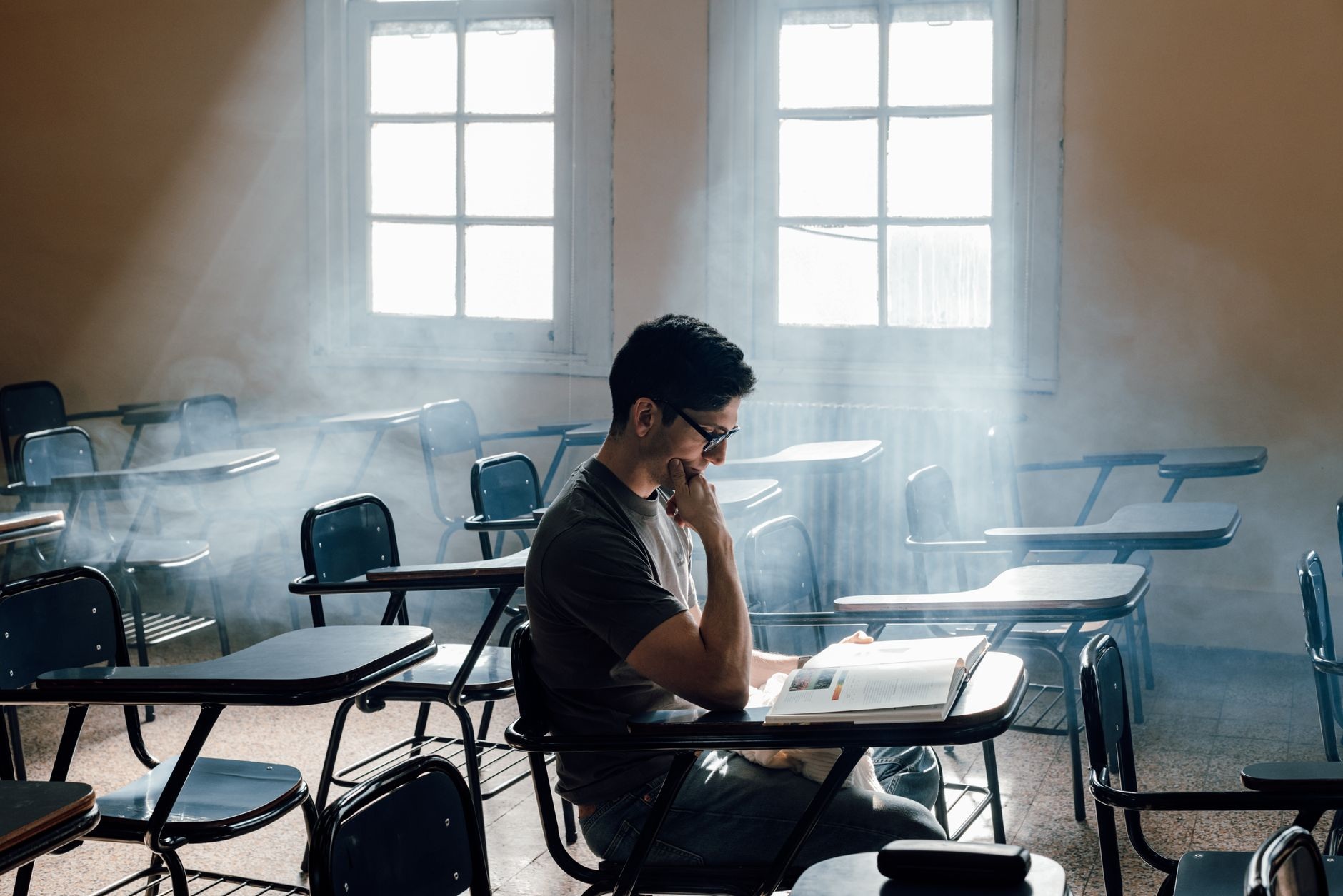 Student Reading in a Sunlit Classroom in Buenos Aires