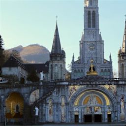 Lourdes bishop covers Rupnik mosaics on doors to Basilica of the Rosary