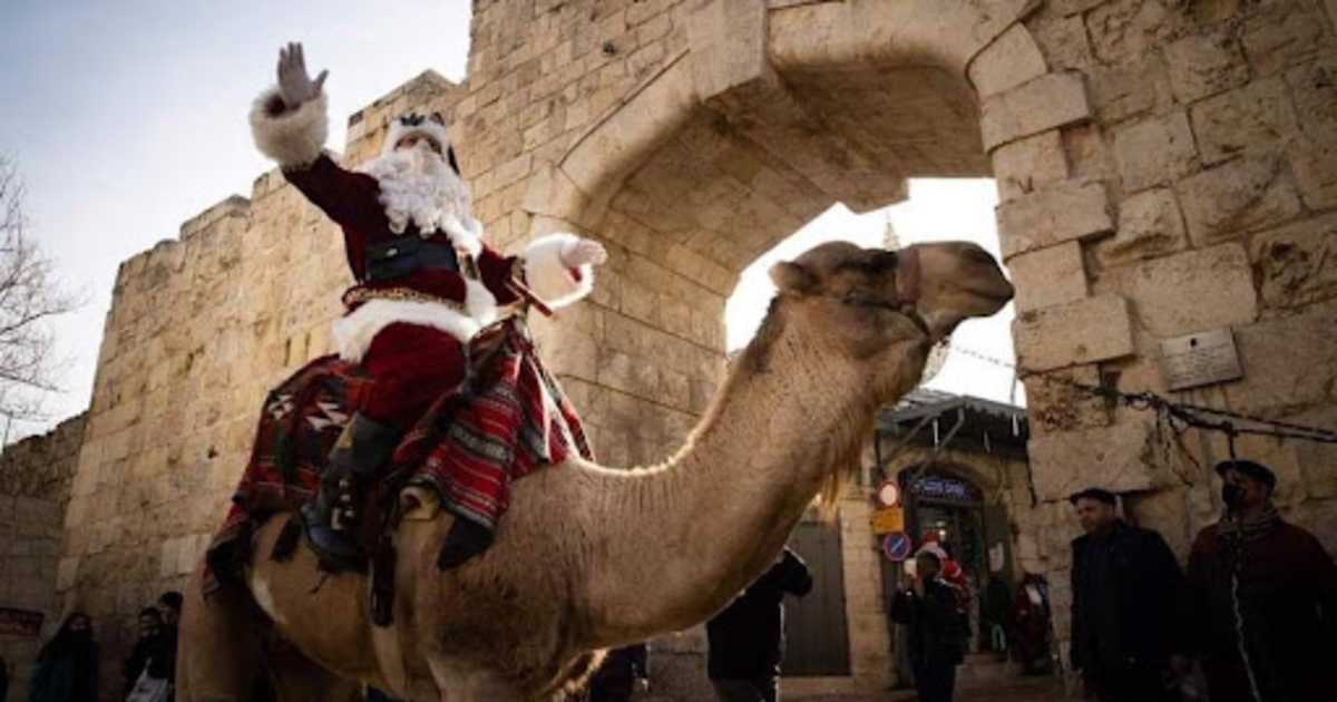 This Santa rides a camel around Jerusalem every year. Here’s why