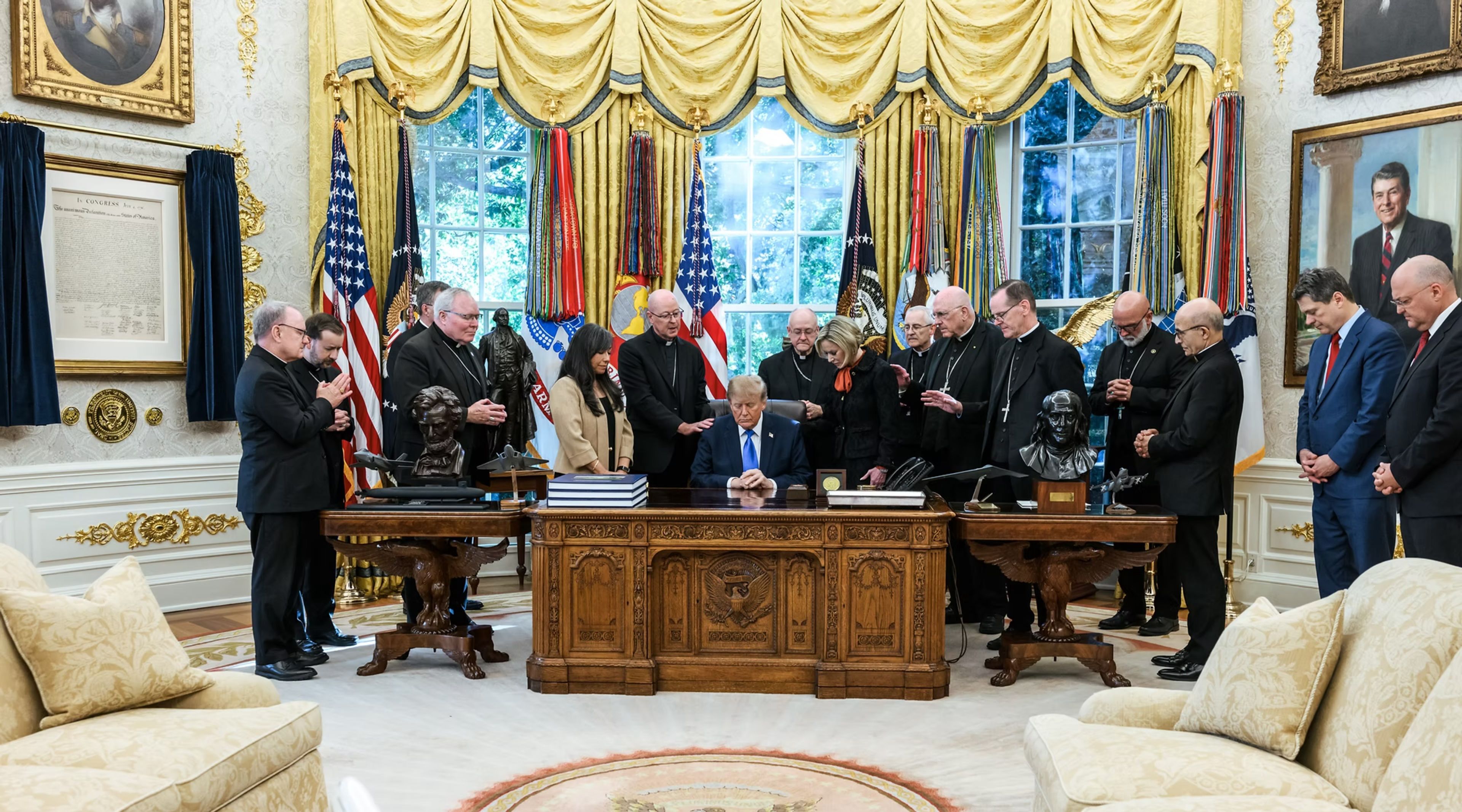 Denver Archbishop James Golka prays over President Donald Trump alongside brother bishops at the White House on Oct. 22, 2026. | Credit: Photo courtesy of the White House