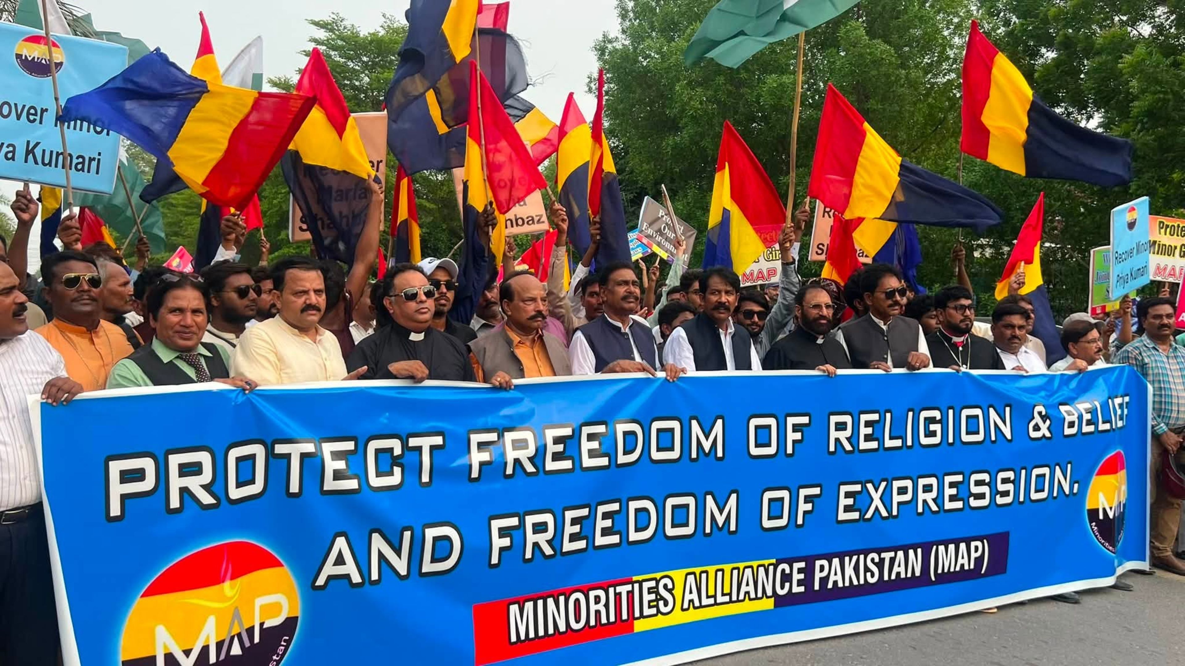 Clergy and activists lead a National Minorities Day rally behind a Minorities Alliance Pakistan banner calling for freedom of religion and expression in Faisalabad, Pakistan, on Aug. 11, 2026. | Credit: Photo courtesy of Akmal Bhatti