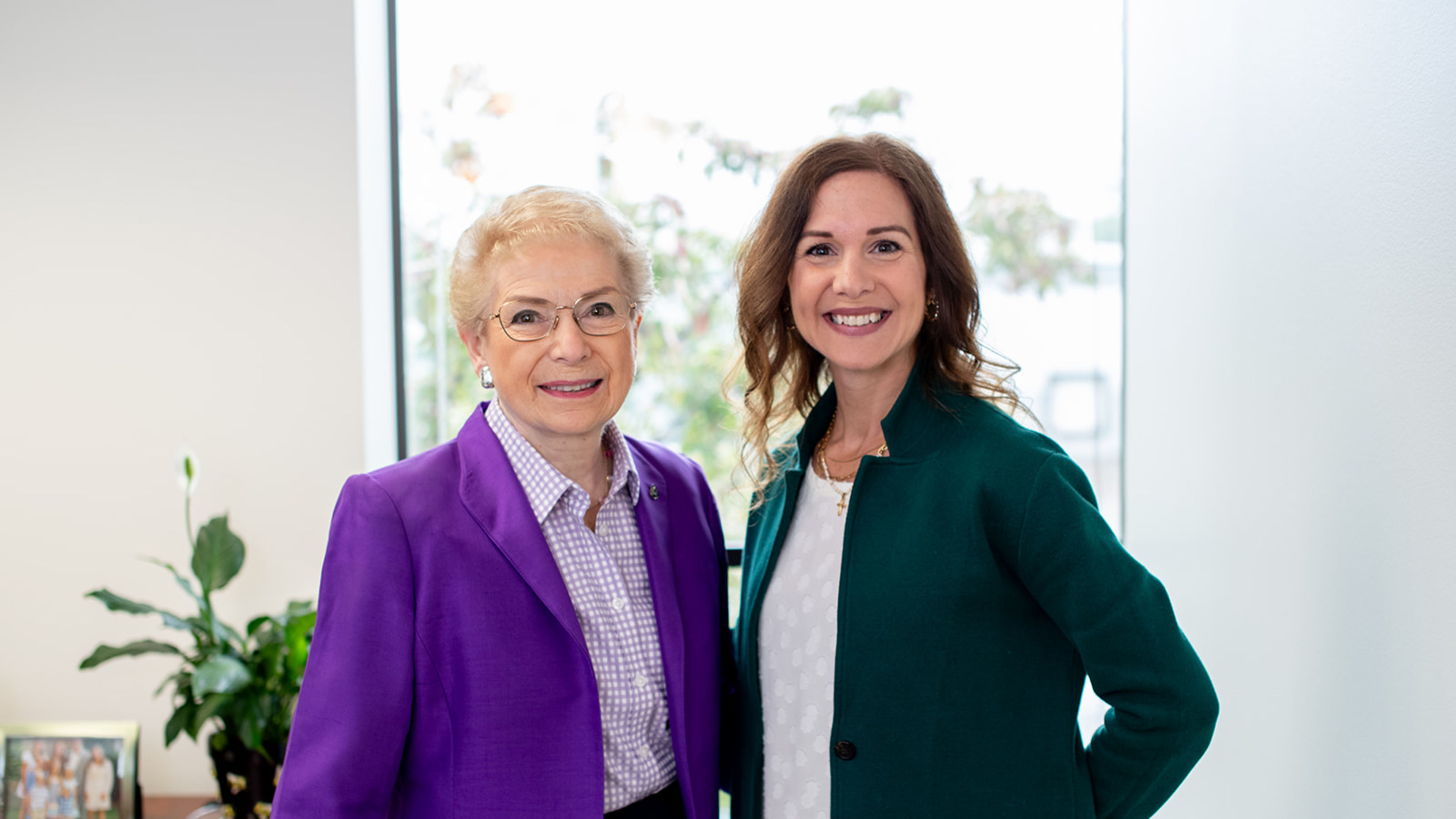 Pro-Life Across America founder Mary Ann Kuharski, left, standing next to her daughter and current president, Angie Johnson, in 2026. | Credit: Photo courtesy of Angie Johnson.