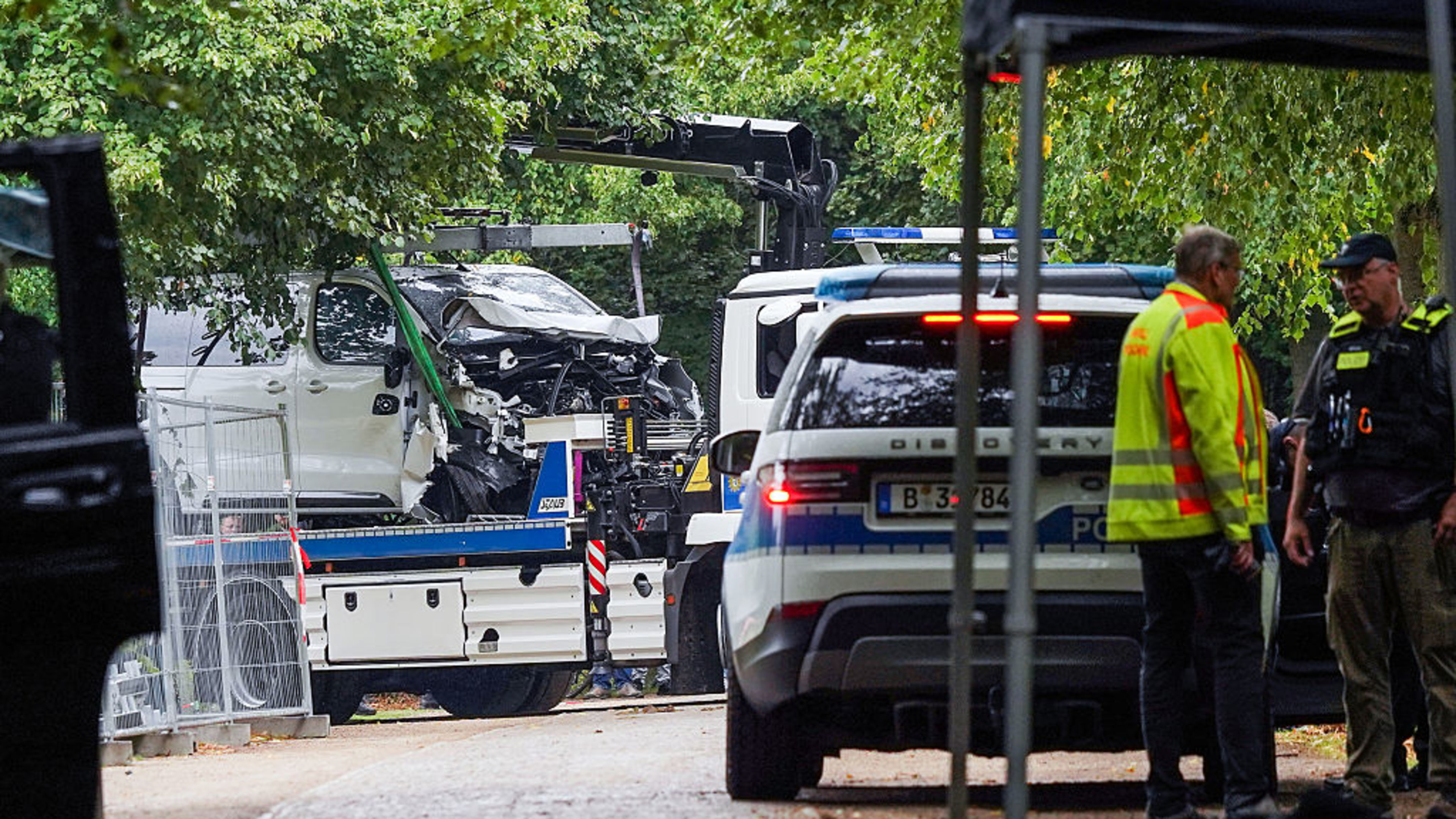 A police truck removes a van from the crime scene at Tiergarten park following a July 25 car-ramming attack on the Christopher Street Day (CSD) parade on July 26, 2026, in Berlin. | Credit: Fadi Yousef-Pool/Getty Images