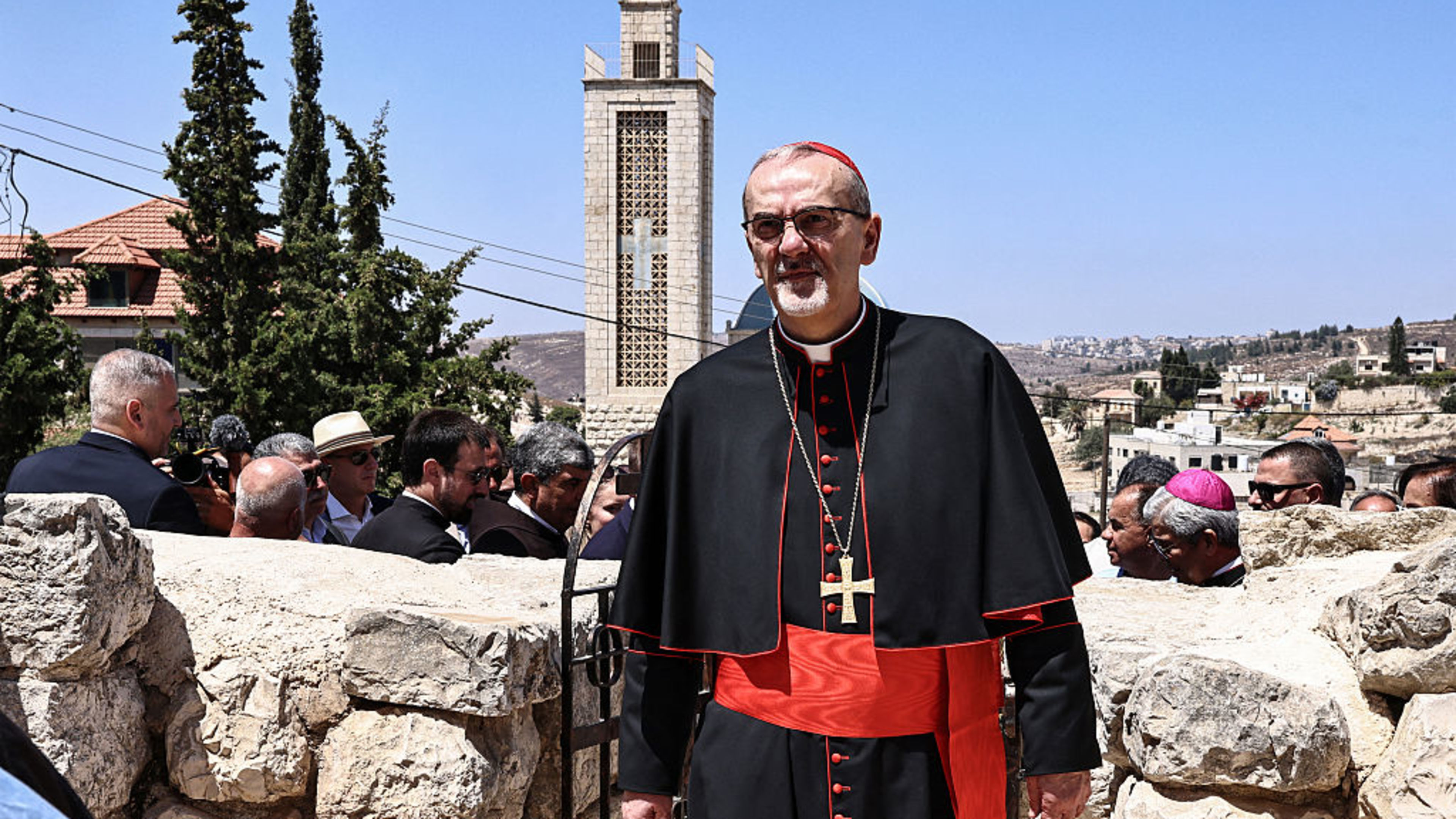 Latin Patriarch of Jerusalem Pierbattista Pizzaballa walks during a July 14, 2025, visit by the head clergymen of several Christian denominations to the fifth-century Church of St. George in the Palestinian Christian village of Taybeh, northeast of Ramallah in the occupied West Bank. | Credit: Zain Jaafar/AFP via Getty Images