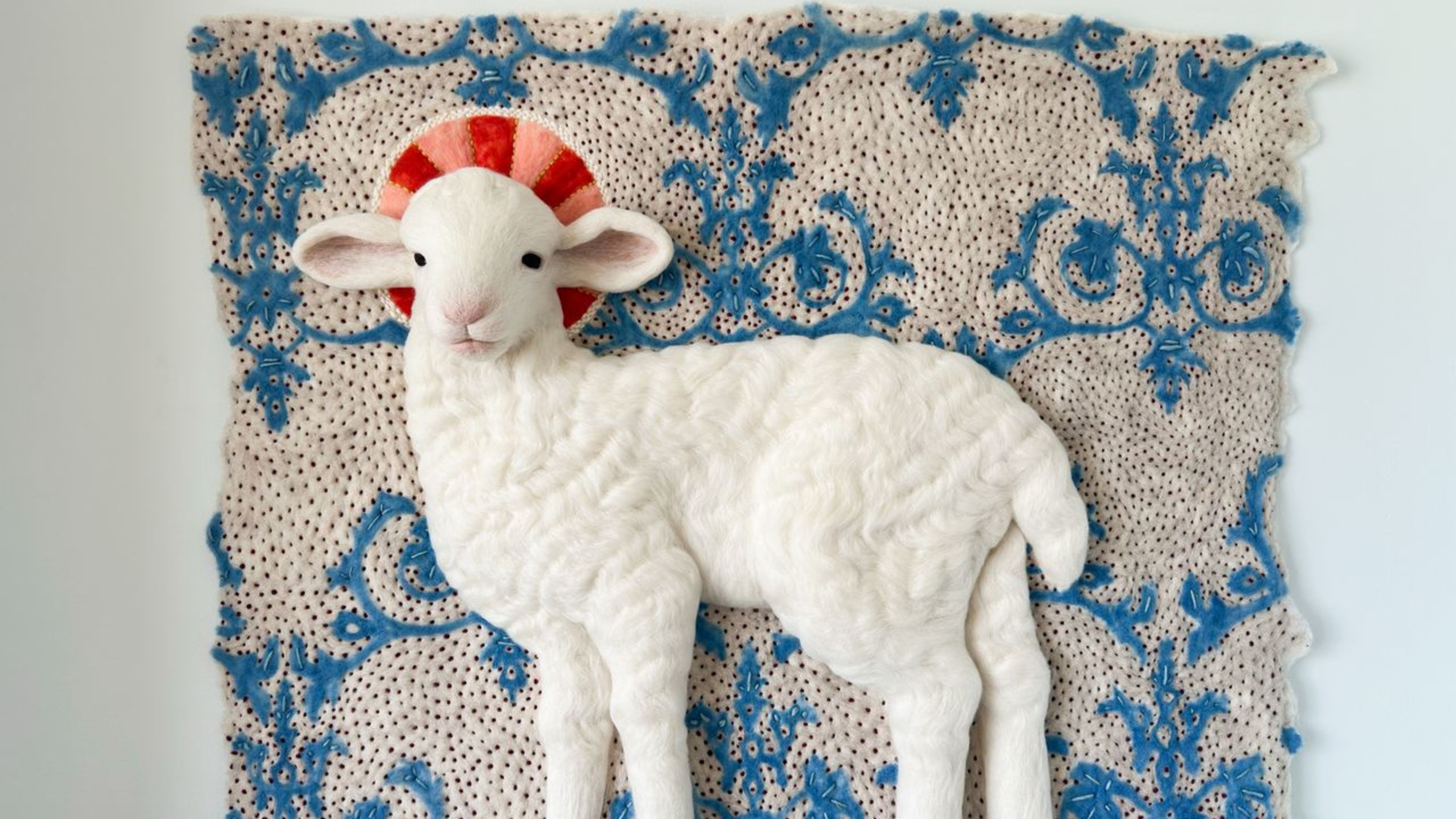 “Lamb of God” by Holly Guertin is made of wool felt with wool embroidery and is about 2 feet tall by 3 feet wide. | Credit: Holly Guertin